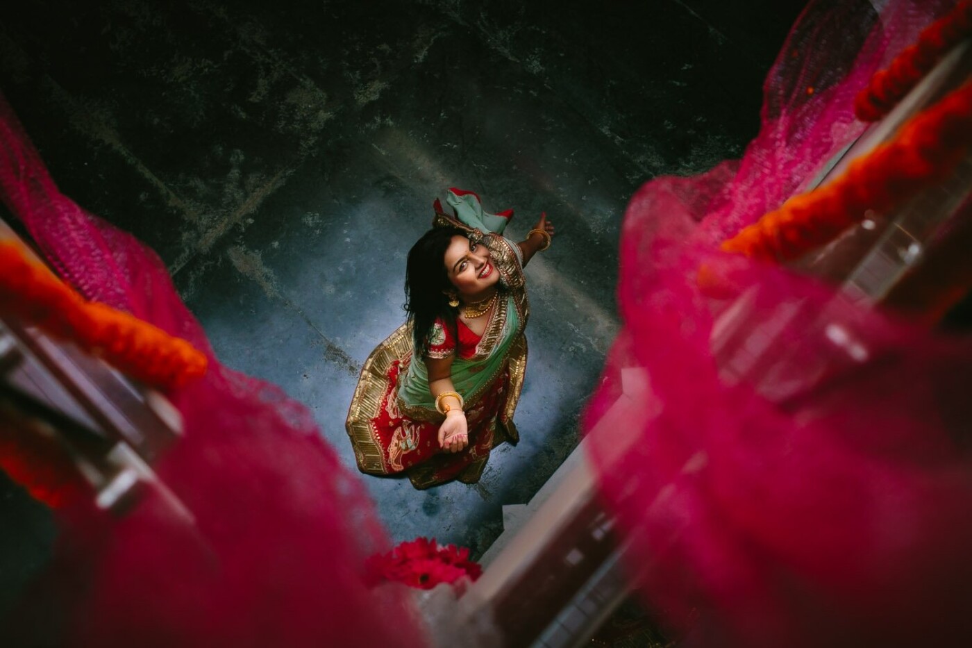 Anisha had a beautiful and colorful Indian wedding in Raipur. I wanted to capture her personality and the colors and energy of the place so I asked her to dance in rounds and have fun. This photo was captured from the 1st floor of her beautiful house, before going to the first celebration of the week.
