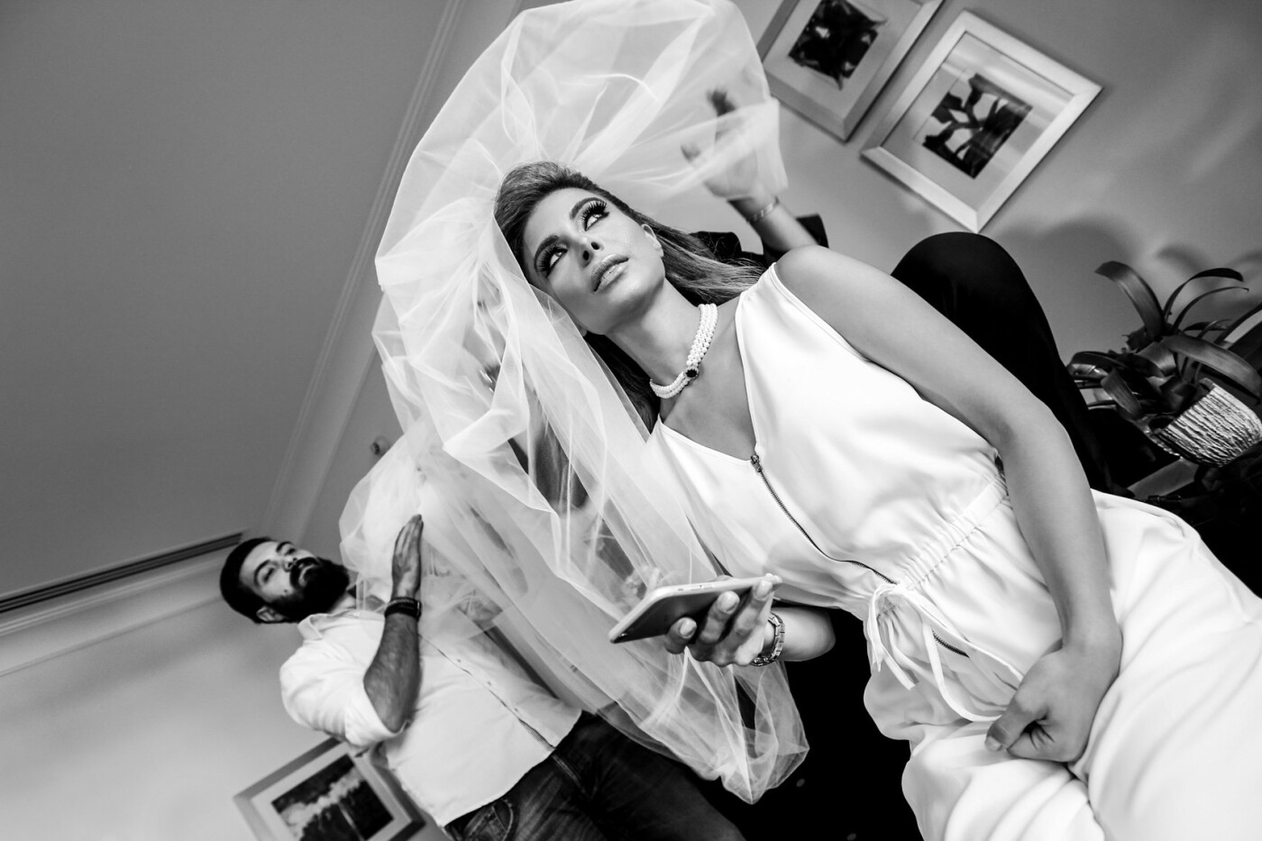 Getting ready photos before the wedding is undoubtedly some of the most genuine and memorable moments of the day. This is one of my favorite classical shots for the bride getting ready, as I admire so many things about it, the lighting, the veil and the look on the bride's face anticipating the moment she's been waiting for, the moment she marries the man she loves.