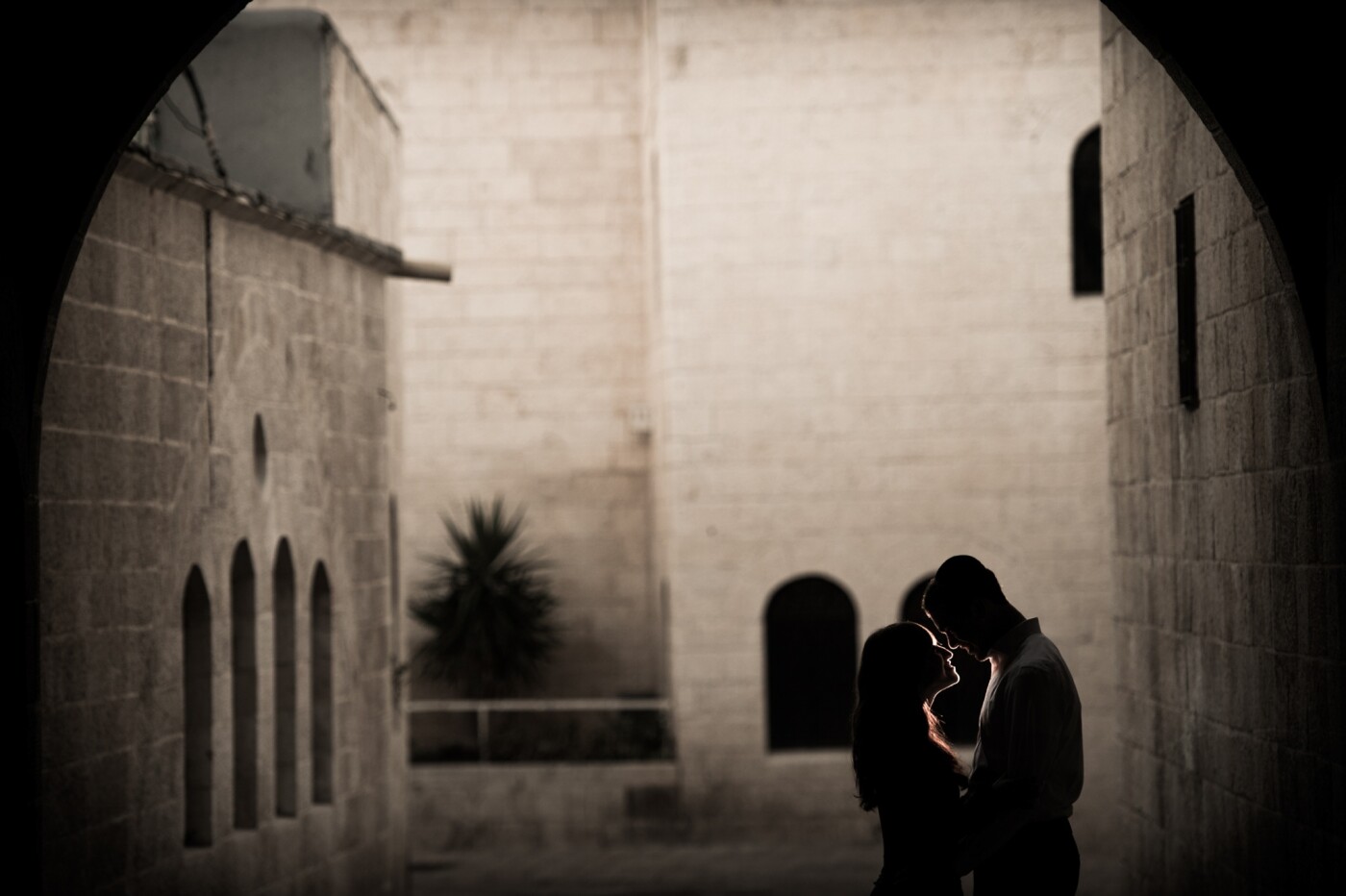 I adore the Old City of Jerusalem. It has some of my favorite spots for photo shoots. But during the busy mid-afternoon, it can come with the challenge of finding a location with the right lighting and no bustling crowds. This tunnel ended up giving me all that and a natural vignette. The look of love in the couple's eyes was the only other thing I needed to make this shot one of my all-time favorites.