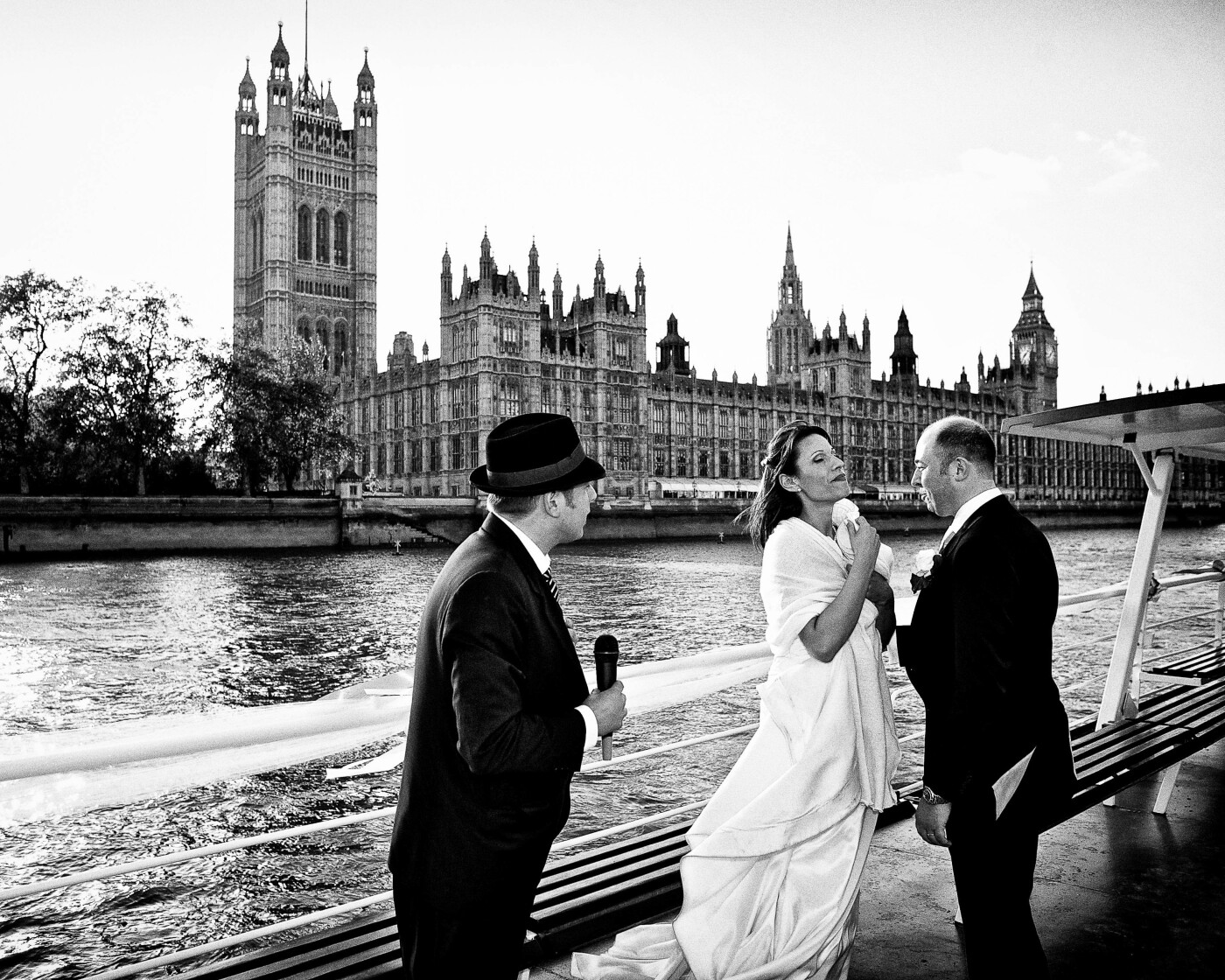 When I was booked to photograph Francesca and Julian’s wedding I knew it would be special and so it was. They hired a boat to held their reception in the River Thames, London and it was by the houses of parliament while their singer was singing a love song, that I was able to capture such a moving moment between the couple. Moments like this do not come very often and I was so glad I was there to capture it.