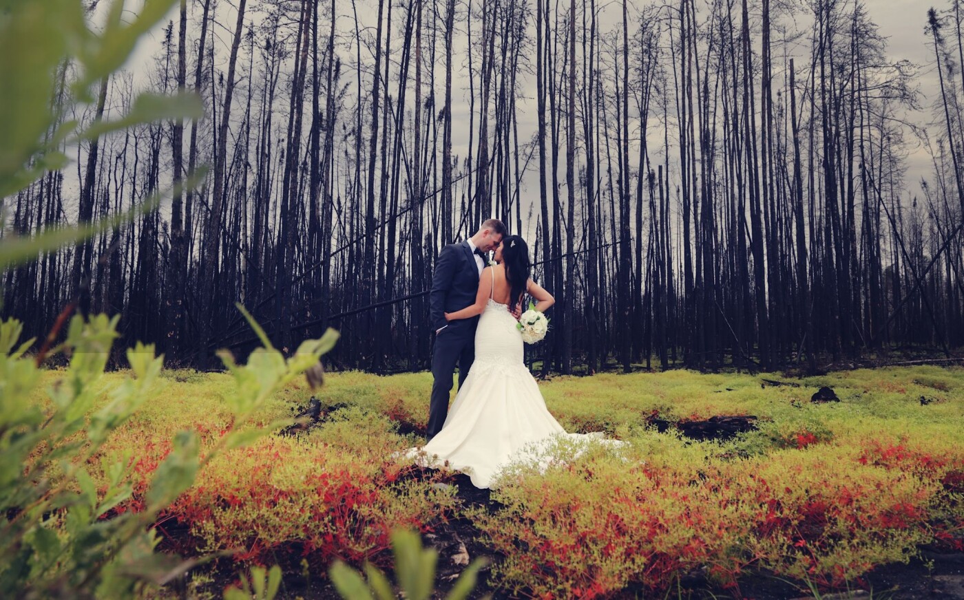 Brandon and Jenny's wedding was on a rainy and wet day in LaRonge Saskatchewan. Last year fires swept through the forests forcing many to evacuate their homes in LaRonge and around. When the groom mentioned the burned down forests I immediately knew that the forests were something I wanted in their wedding photos! They looked stunning against the black forest and new life growing from the ground up. It almost seemed symbolic as if it stood for the beginning of a new life! It was a fantastic day with two amazing and genuine people and their families, I could not have asked for and better couple to spend a rainy day in the forest with.
