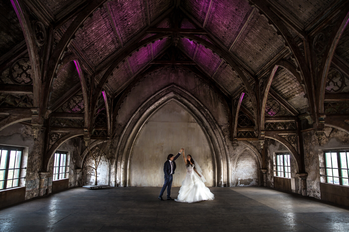 This picture was taken in a former church from 1857 in Utrecht the Netherlands. <br />
The scenery was taken at the upper floor from the building. The original ornaments were still there and the light was stunning. A great scenery for the perfect bridal shoot.