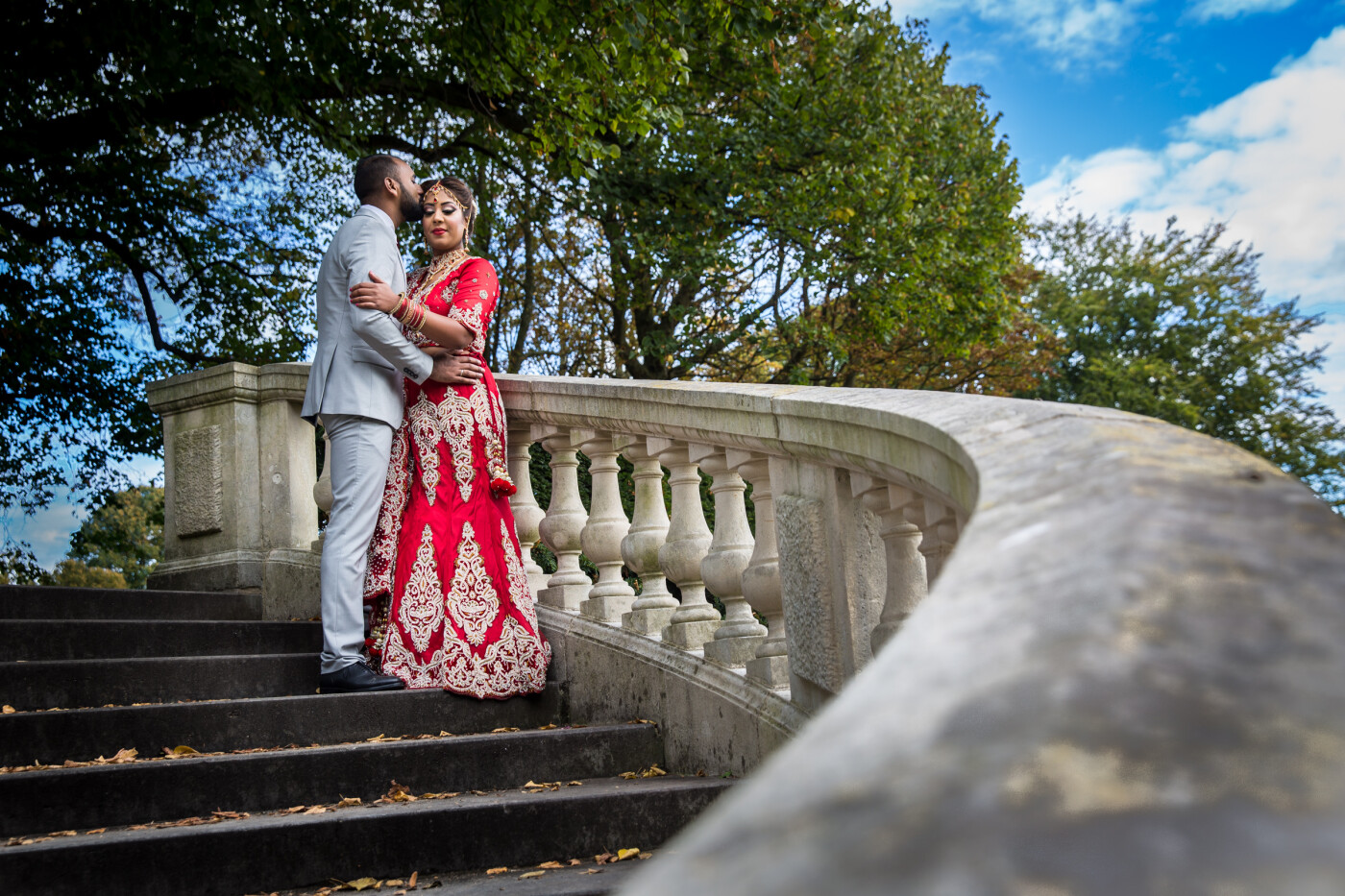 This picture was taken in the most beautiful park in the Nederlands. Clingendael in the Hague, a park with a variety of landscapes.<br />
This was an after wedding shoot of a Indian bride and groom. The bride was wearing a traditional Indian wedding dress. This shot on the stairs, was an idea of the groom. So all credits to the groom.