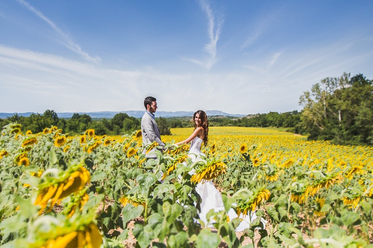 This photo whas taken not far away from where I live , in the Ardèche..there are so much sunflowers..and the view..it was lovely ! 