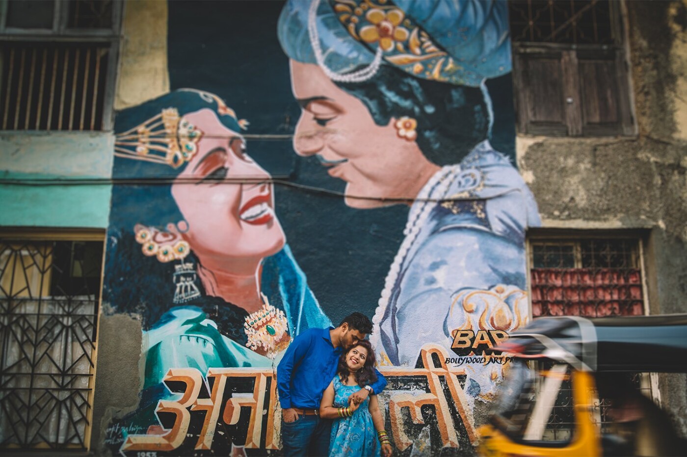 Bombay is a place where love for Bollywood thrives within its people, in the streets, in its art and in its music. Walking down the narrow lanes of Bandra, is like walking in a film itself - filled with wall art created by people from all over India and the World. This picture, perfectly fuses the romantic and lively love of this couple like you'd see in a Bollywood film. You just know when you see them together, their love is fun and quirky, filmy and energetic. 