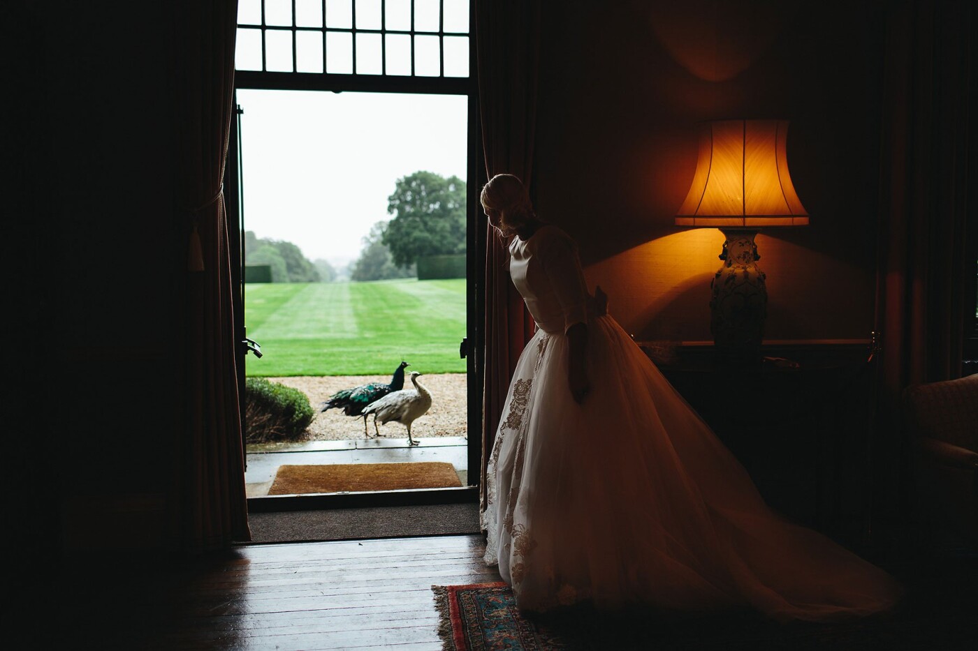Hampden House is set in the heart of the stunning, wooded Chiltern Hills in Buckinghamshire, UK. It’s a beautiful and charming location for a wedding day. This was taken during the wedding breakfast when two peacocks decided to check out the wedding themselves.
