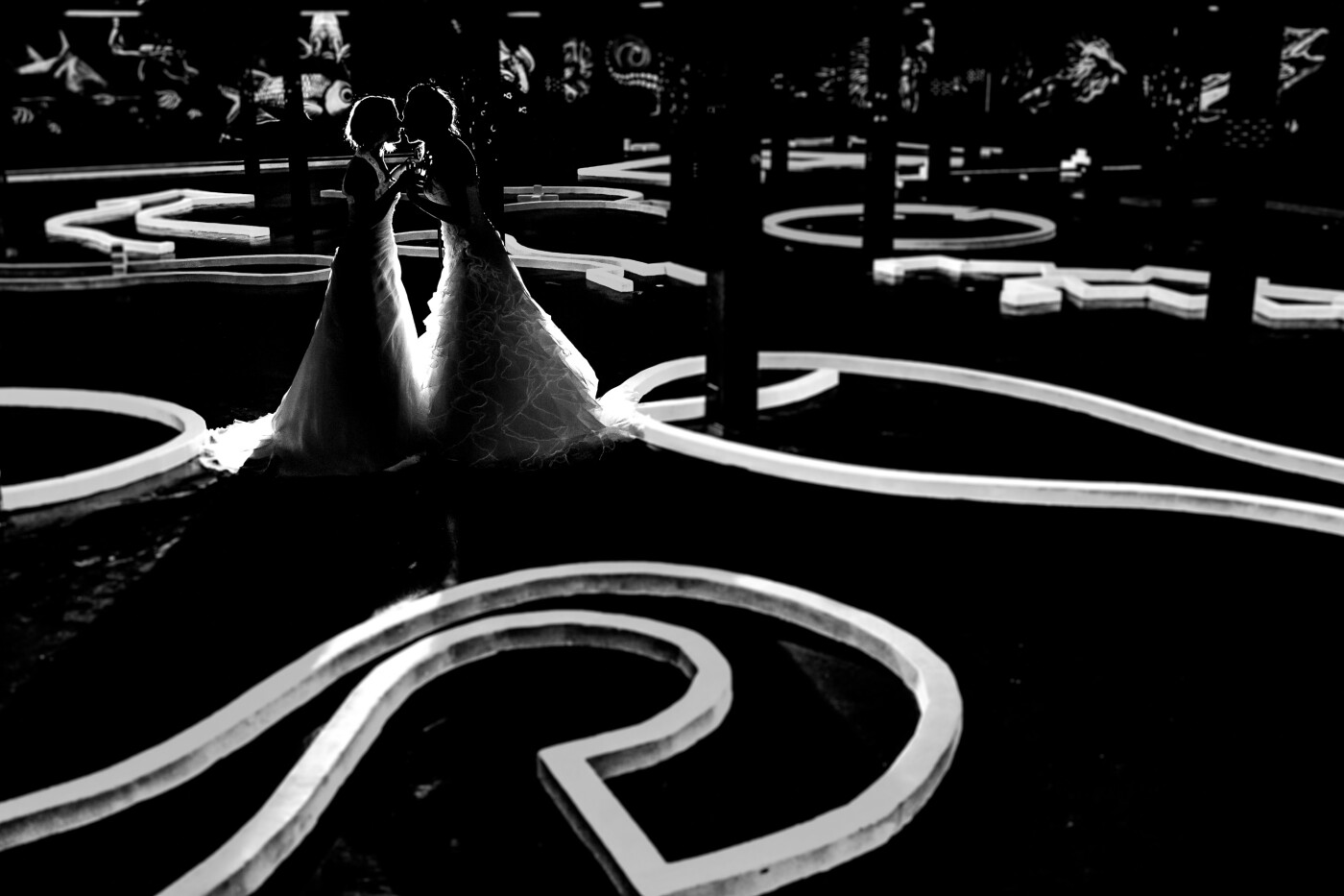 This photo was taken in a closed amusemend park, during the wedding of two beautifull ladies! The park was indoor amusement park, mostly for children. We got access and in the attic we found a blacklight minuture-golf. It was awesome to shoot there! When i'm on a location, I actualy only look for stairs up..... or stairs down... thát's where the interessting places are :) 