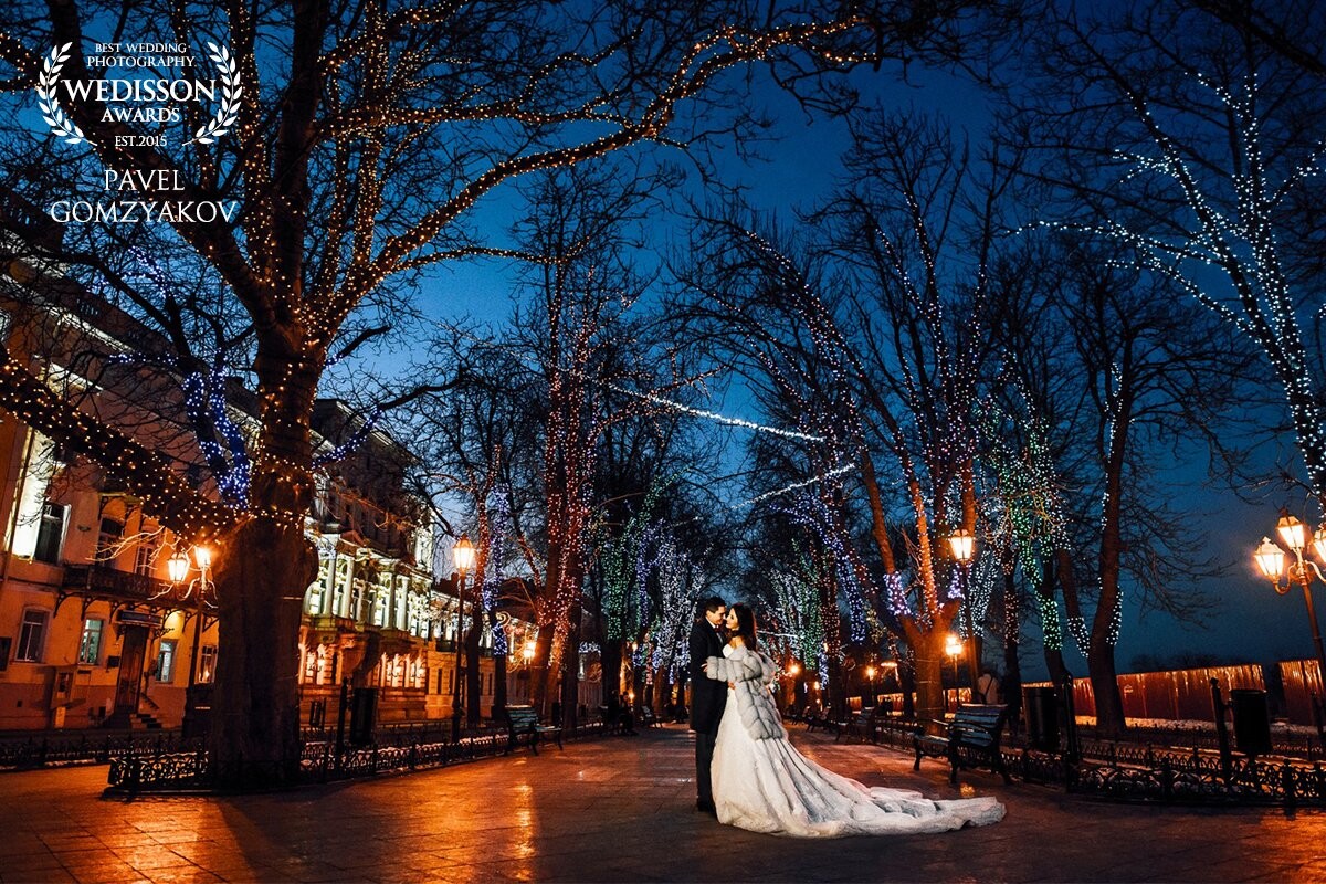 In the photo the couple from Odessa Olga and Alexei. This image was shot in January 2017. The city is decorated with Christmas lights. This creates a unique fairy-tale atmosphere!