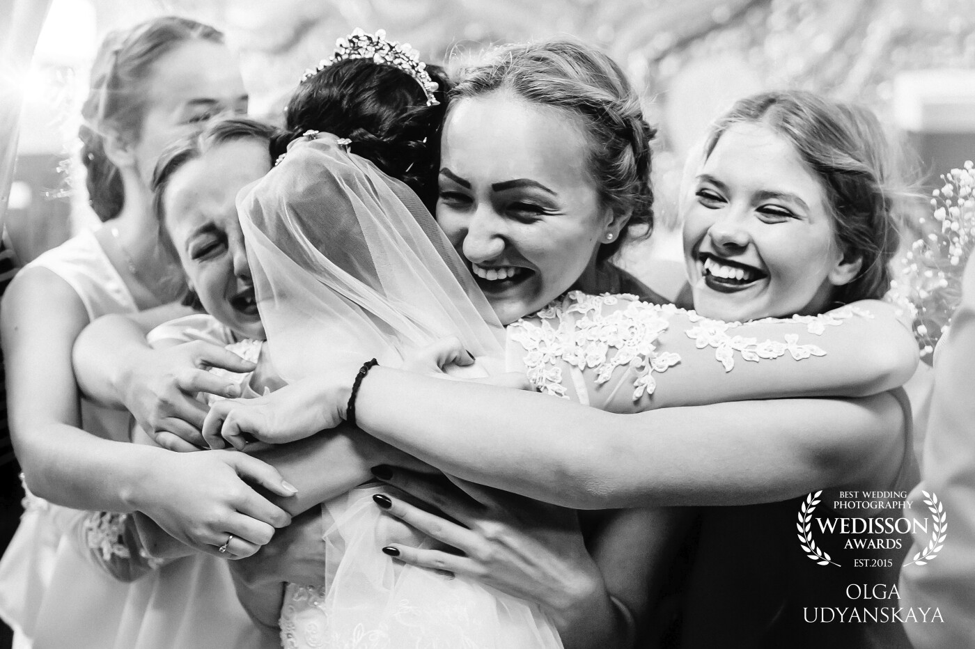 Wedding of remarkable couple of Alexander and Elena who has taken place 9/30/2016 in Rostov-on-Don. Children work as leaders in children's camps, the wedding has been filled with different surprises from friends, none of guests hid the emotions, on registration both cried and laughed. The picture is taken, at the time of a congratulation, after the registration ceremony. It is so much sincere feelings: love, pleasures, happy tears, remained in this photo and for future generations. The photo transfers all atmosphere of a celebration.