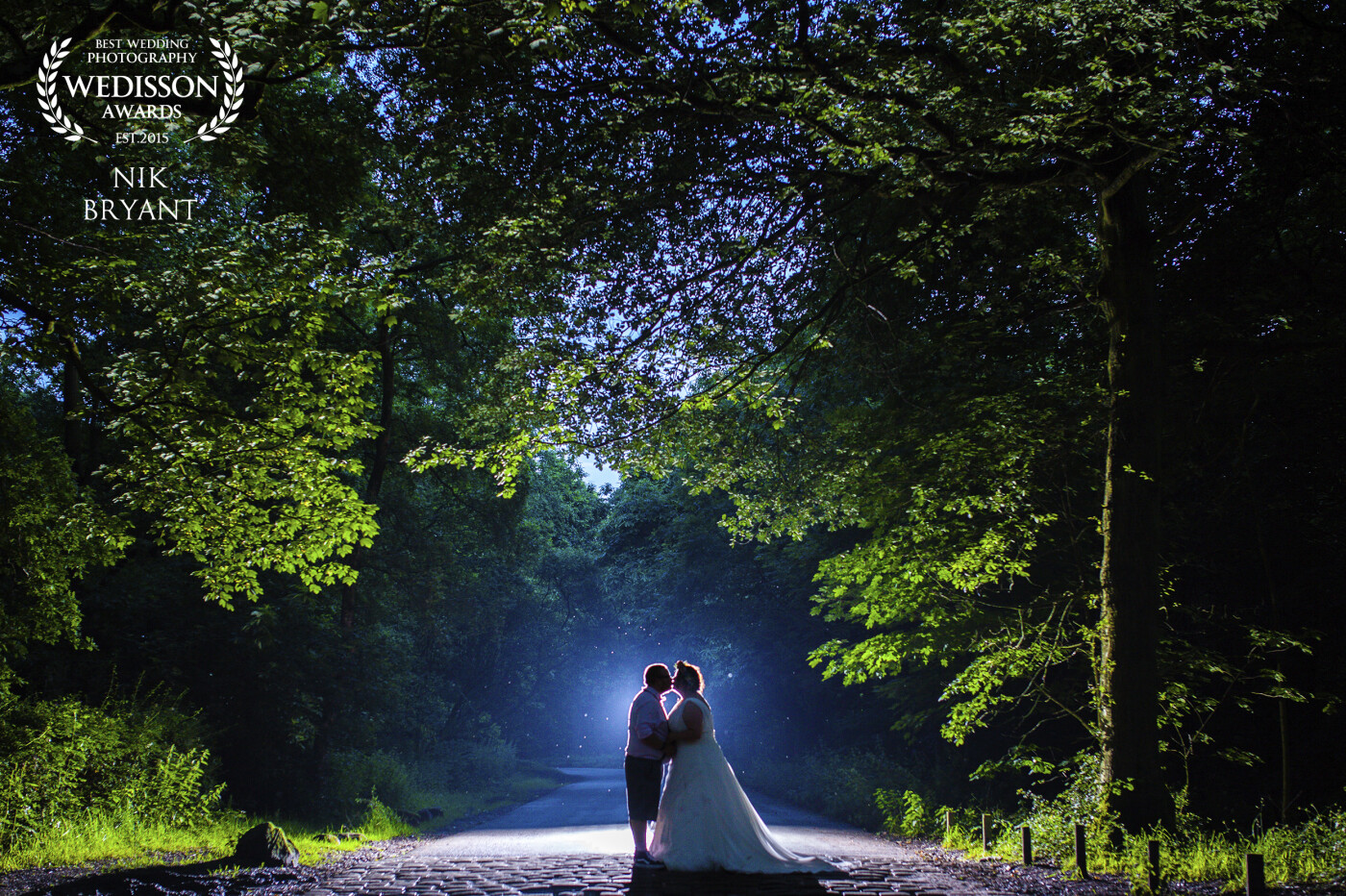 Taken late on the evening of the wedding the couple wanted a little time to themselves before the first dance so we went out to create this image. Just something simple yet colourful and slightly magical.<br />
<br />
One of my favourites from last year without a doubt!