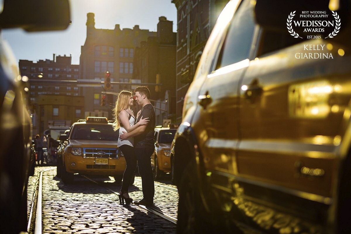 We were out on a gorgeous day in Hoboken with Nick & Bridget.  This was the last shot of the day as we walked out of the city.  This photo was taken right outside of the train station where the taxi's line up waiting for passengers.  Between the taxi's, the cobblestone street, the buildings and the gorgeous light this photo encompasses all that they love about the city.  