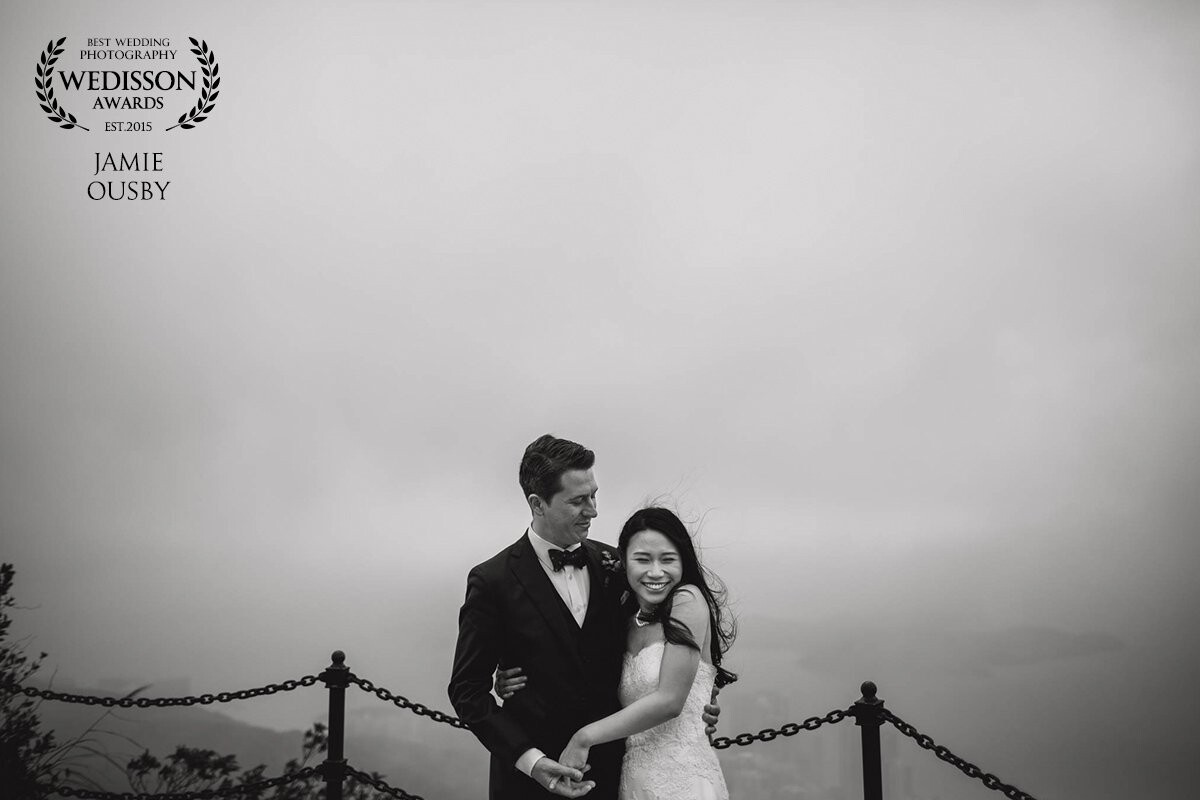 A beautiful moment high on The Peak in Hong Kong with Sharon & Lee. It had everything - wind, great light, great connection and it worked great in black & white.