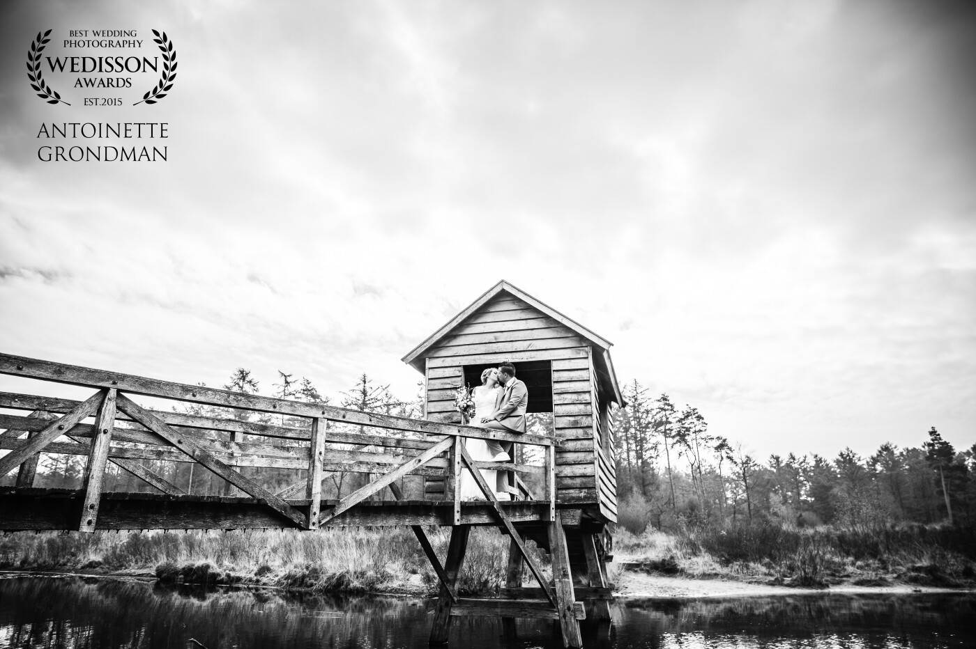 This was a really fun couple! They trusted me completely (and had so much patience!). The sky, water and the wooden shed were the perfect setting, the bride and groom complete it. 