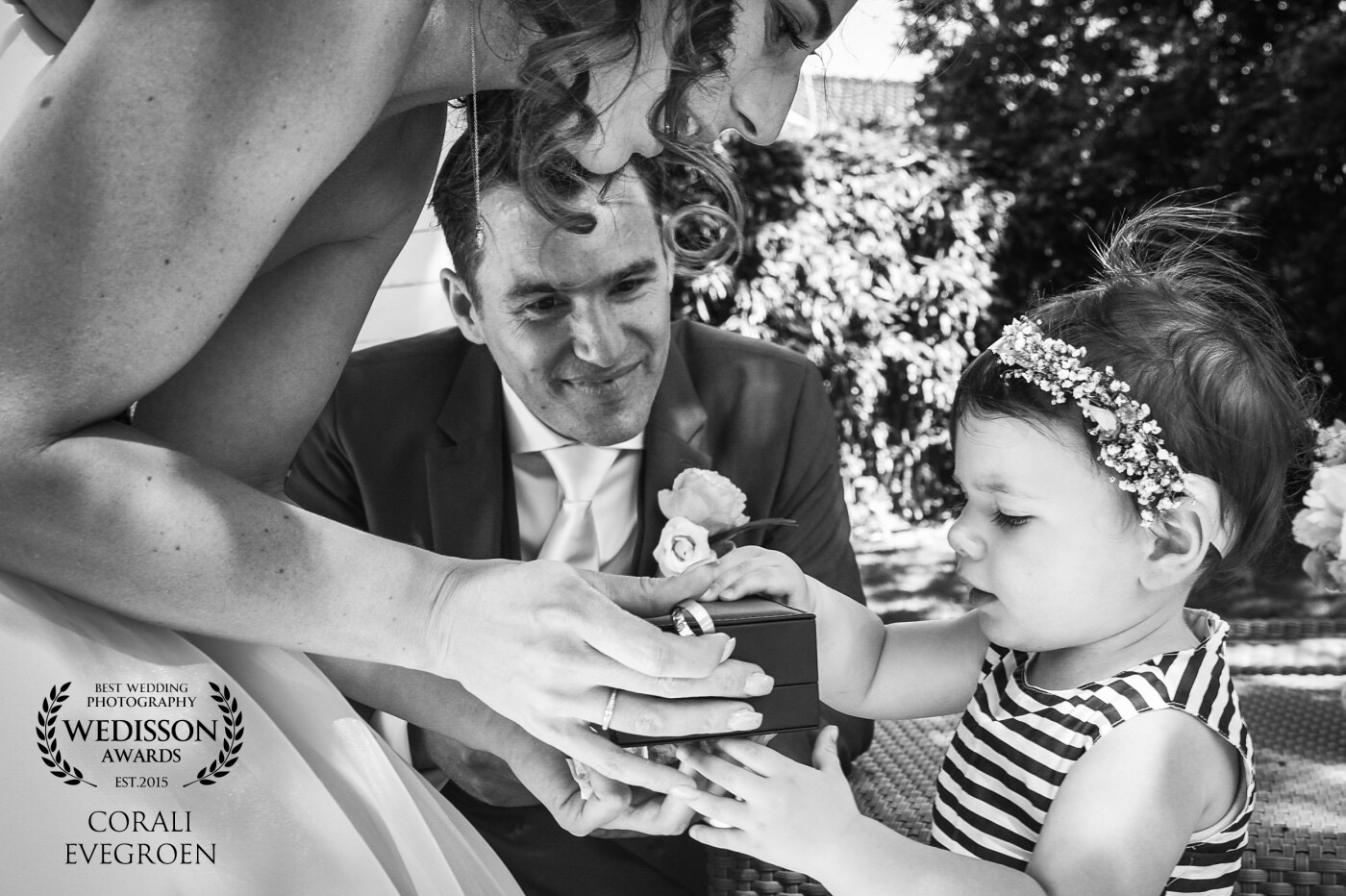 This little bridesmaid was given her parents the weddingrings. She did it perfect because it was a real serious job! It was a beautiful moment to capture!