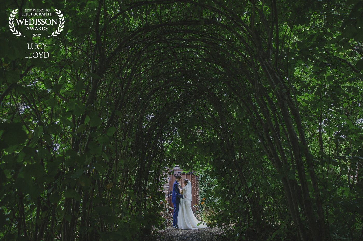 This photo was captured during a lovely wedding at Madingley Hall, Cambridge. This was one of my favourite weddings.  The gardens of Madingley were really beautiful plus there was this long arch way of trees which I was really excited to include in the portrait photos.  Jonathon and Negin were amazing to photograph. They were so happy together, which really shone through in the photos. 