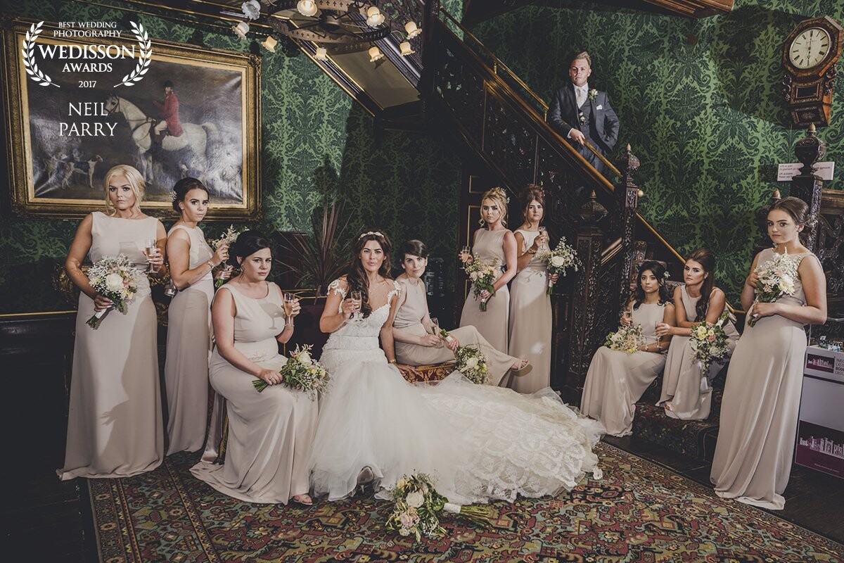 With larger bridal parties, I enjoy getting creative and coming up with new ways to shoot the group shot, something other than everyone all stood in a line! Here is the stunning Fiona with her beautiful bridesmaids at Bodelwyddan Castle in North Wales, UK.