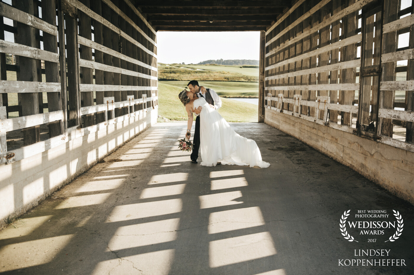 While searching for a unique spot on a golf course we pulled up to this little gem of a bridge reminiscent of a chicken coop. The structure made for some neat shadows and lines and it tied in perfectly with their country styled wedding. It's also an added bonus when your groom loves a good dip. Congrats, Justin and Lauren!