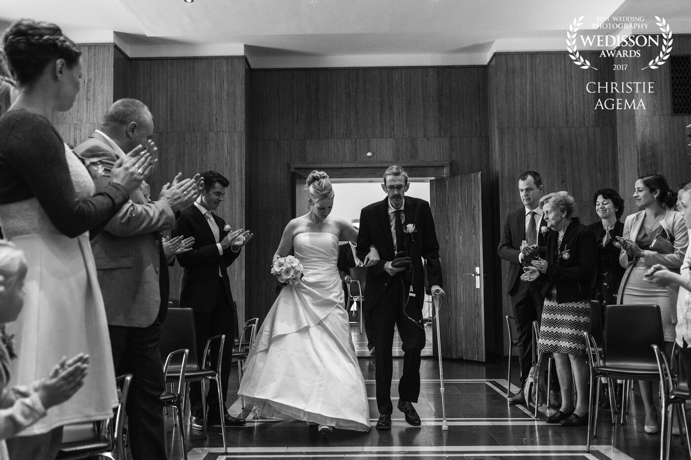 This image from this wedding is really special to me. I just love how she is more concerned about her dad, when he is walking her down the isle  then noticing all the family and friends applauding for her. It is just her and her dad for a moment. <br />
Three weeks after the wedding her dad passed away. 