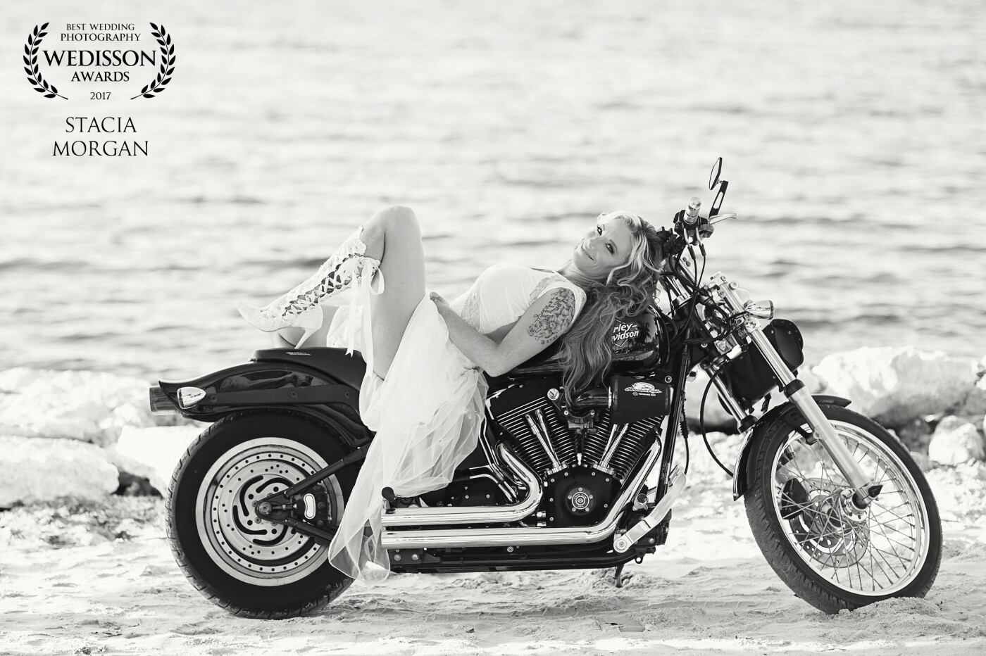 Renae’s Harley inspired wedding day was so kick butt, I had to get a shot of her draped on her man’s motorcycle! It was the perfect bridal shot! The groom went wild. 