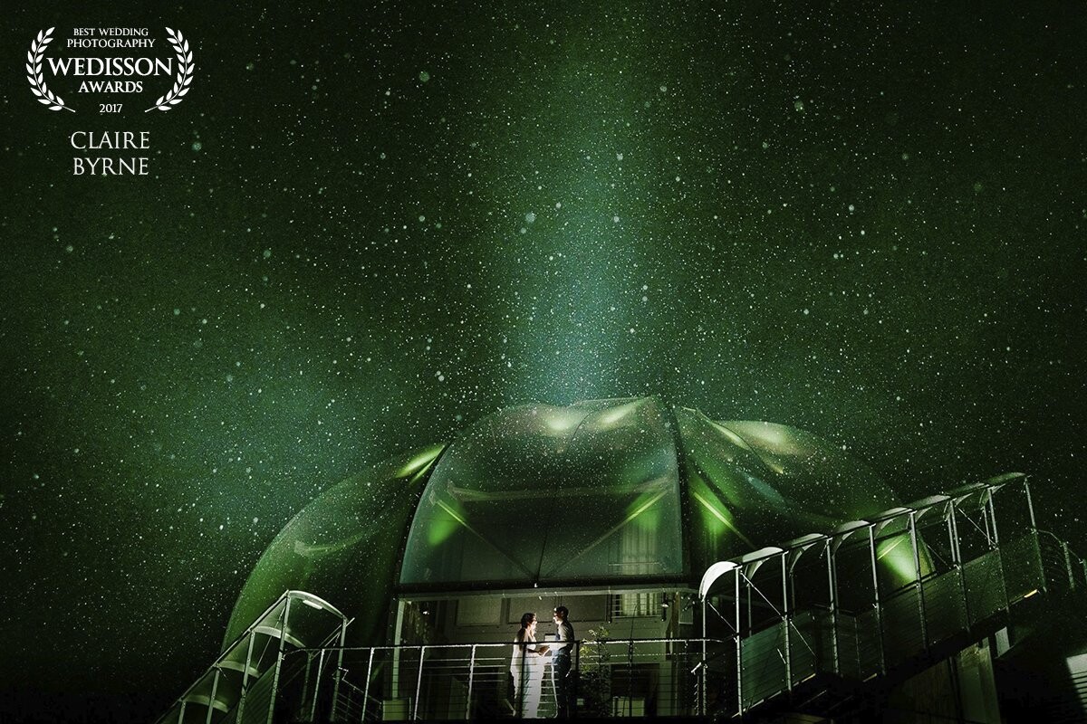 When I drove up to the hotel, I noticed their spa had a dome that changed colours. I knew I had to do a night shot there. It was even better that it was raining when Claire & Ronan left the dance floor to make this magical 'northern lights' image.