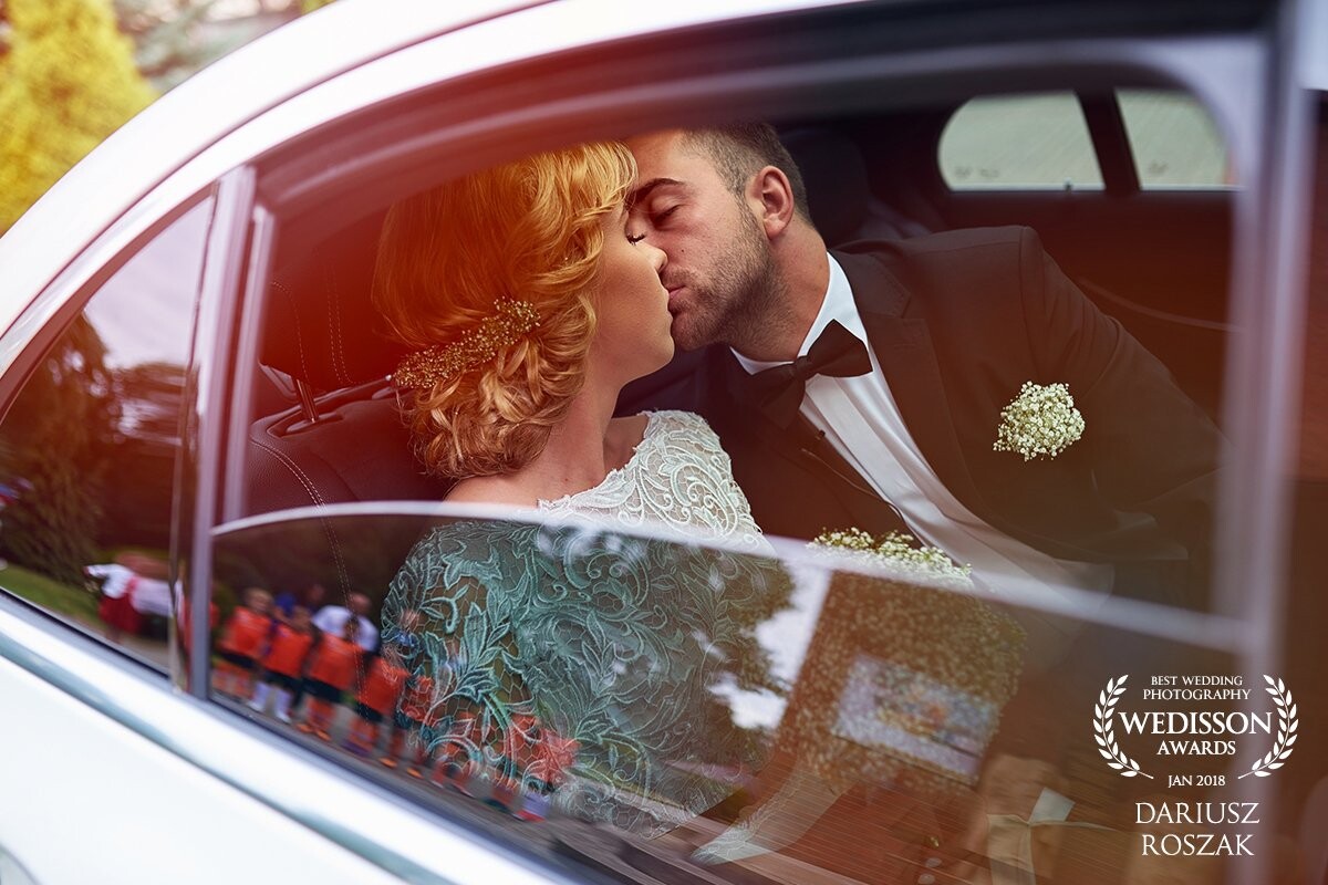 This shot was done in wedding day, just 3 min before Church ceremony. Sebasitan (groom) was football trainer, look at the reflection in the car window you'll see young footballers waiting for favorite trainer ;)<br />
In this shoot I've used icelight inside the car.