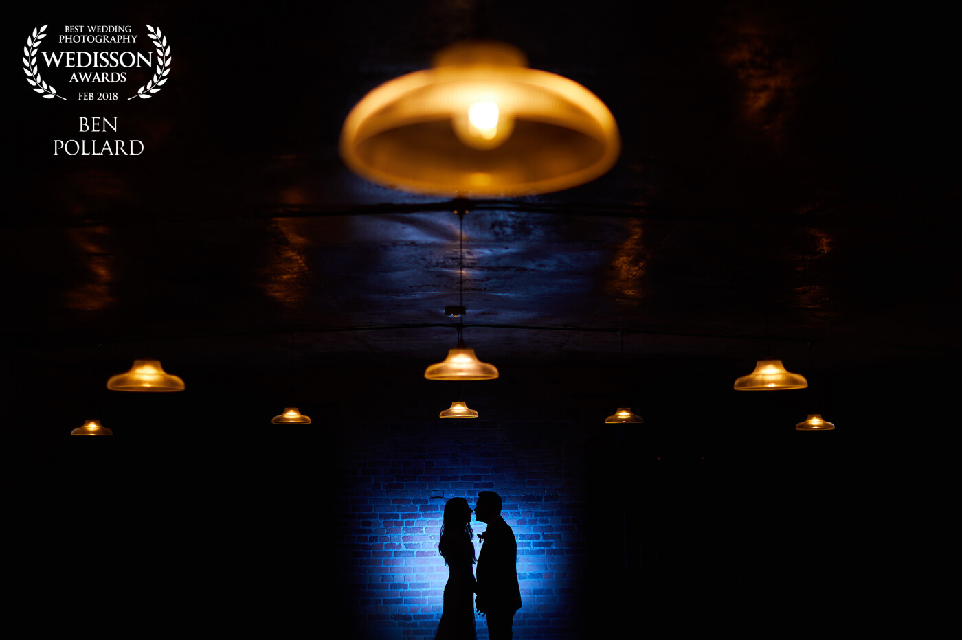 A highly popular local venue to me. I'm always looking for something new with every visit. I've done this picture previously, but what works so well in this frame is its clean simplicity. A blue gelled flash behind the couple is my only lighting.