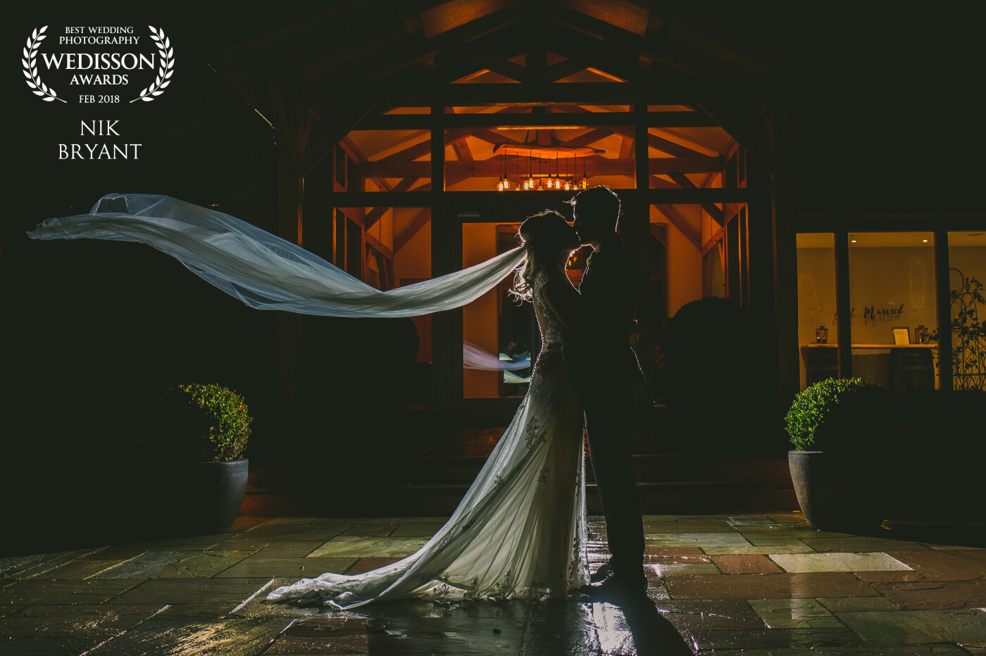 It was New Years Eve and it was cold and wet but Becca and Jonny were quite happy to get out and create something different. Becca wanted to show off the veil so we thought a veil toss silhouette would be perfect.<br />
<br />
Shot at Pryoys Hayes  Golf Club and Wedding Venue in Cheshire