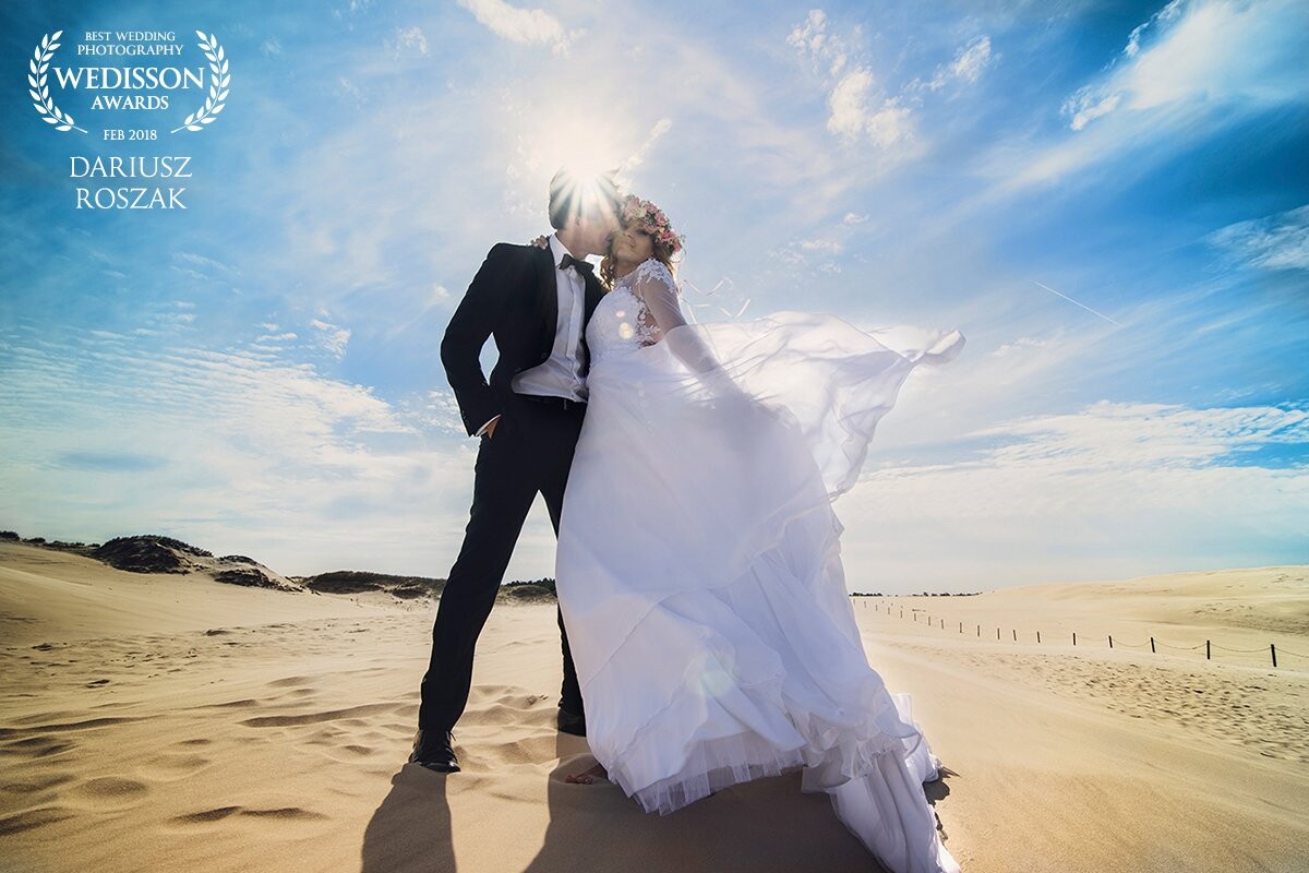 If you are looking for a desert, come to Poland by the sea to Łeba. I took this picture in the morning, the wind was really strong, and my camera needed regeneration from sand and salt after this session;) I wish every photographer such a great job for the bride, the work was perfect.