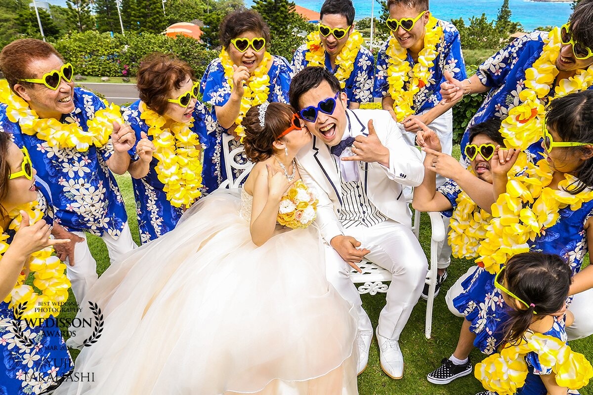 Masahiro & Risa, a charming and friendly couple, had a wedding at St. Catalina Seaside Chapel.  The chapel is located at the most beautiful place in East Oahu, Hawaii.  After the ceremony, the couple gave families and friends leis and heart-shaped sunglasses.  They did make a  photo shooting much sweeter!  They asked bride more kisses many times! Groom burst out laughing!  It was the time that I took the unforgettable moment on their Big Day:)