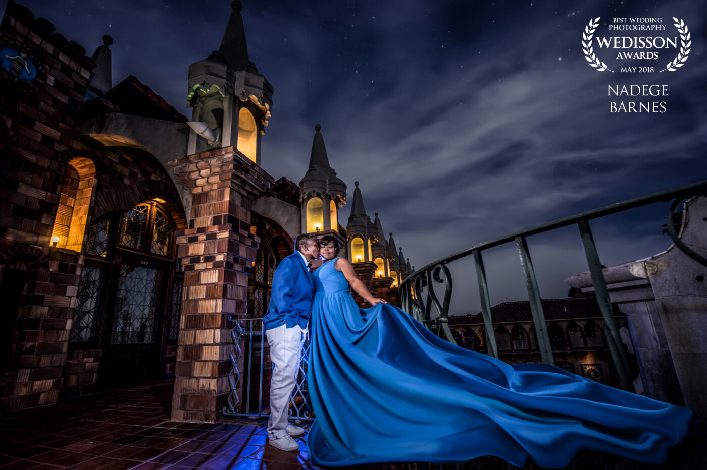 Taking night time pictures is one of my passion. I also love Disney  and castles. Well, this one was pretty much a combination of everything I love. We worked a lot of the wardrobe because i wanted some drama. tHey wedding colors were blue and white, which was perfect to pop them out in the photograph. So romantic....
