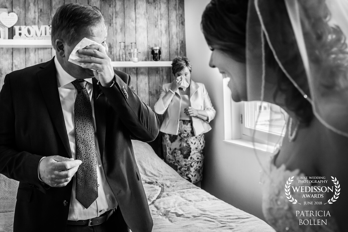 Mother cried from the moment her girl was dressed. When we gave the father a first look :-) he also start crying. The bride couldn't stop laughing. <br />
I love to catch this emotions.