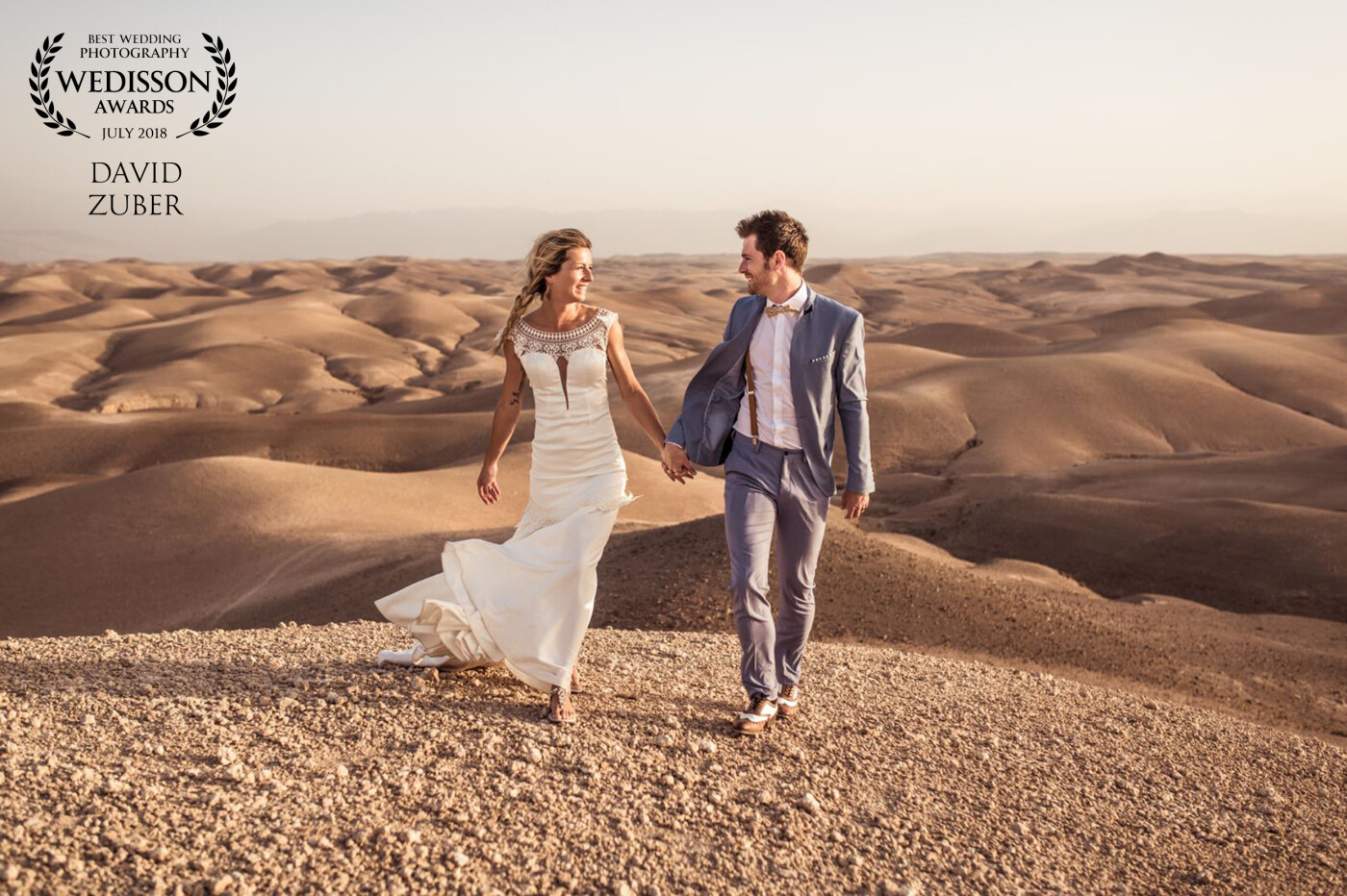 We were in the Agafay desert near Marrakech. I had already imagined this image before going there and when we were there, the bride and groom, the light and the landscape everything was present to give life to this image.