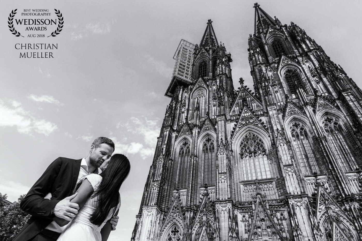 The delightful couple had their wedding in Australia, her origin, but he is originated from Germany, so they celebrated one part of their wedding party in Cologne, in a restaurant near the famous Cologne Cathedral. Because it was on a busy Saturday with thousands of people, I took this picture with a wide angle lens from a lower position to fade out the other people. A little bit pity, that there are the scaffolds on the spire, but it is really difficult to find this beautiful landmark without any construction activity. I could retouch it, but I decided to let it in the original state.