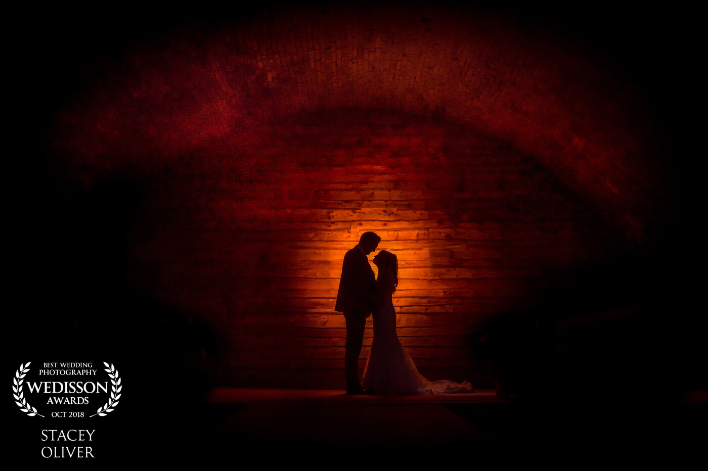 Chris and Emma were an amazing couple and let me try anything on there wedding day. I’ve not shot at this venue before but it was absolutely amazing. This image was  taken beneath a former railway bridge and the groom was holding the OCF with an orange gel pointing towards the wall. I love how the whole bridge is lit up. 