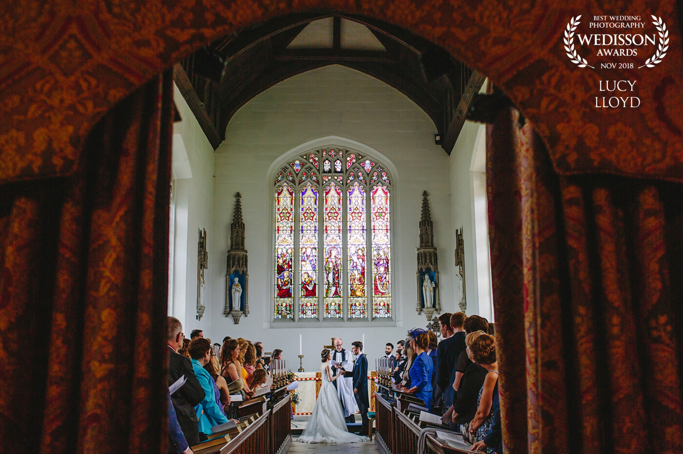 A wonderful moment during the Ceremony at the very beautiful Magdelene College Cambridge. There was very little room for me to stand at the front to capture the ceremony, but as the scene from the back looked so stunning - so I didn't mind. 