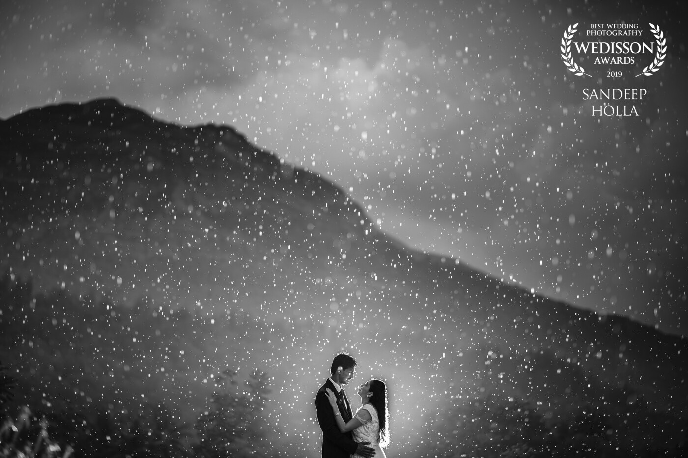 Couple Ashok and Ashika wanted me to capture a moment that will be preserved forever! It was a rainy day in our place and I took the couple out for a drive and found this place and had to take the shot!<br />
The rain is lit with a strobe from behind!