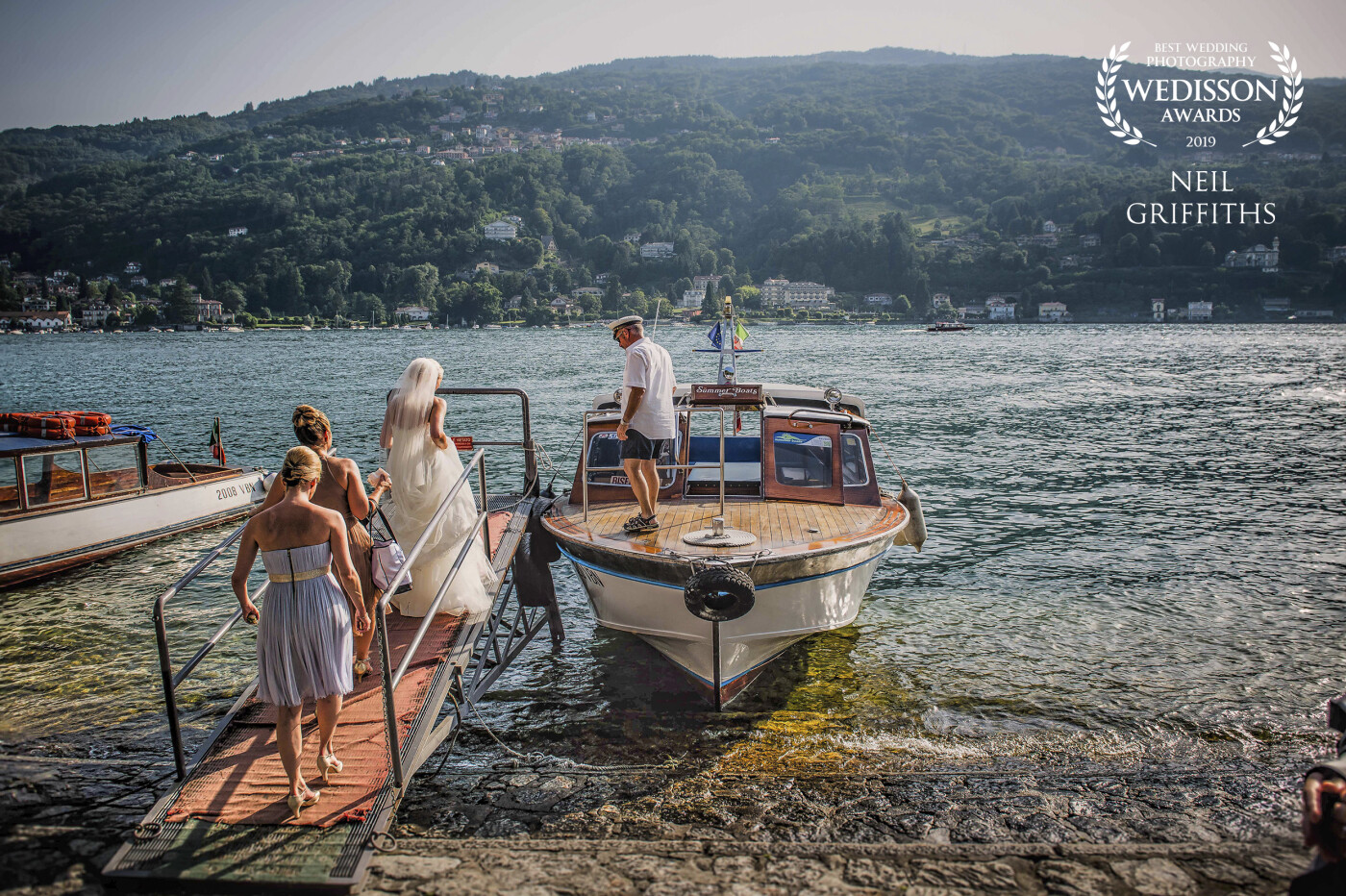 Amazing location, Baveno near Milan. The couple chartered a speedboat for half an hour to go with their bridesmaids to an island on the lake for some pictures. This was what I got as they returned to the boat. Wonderful light.