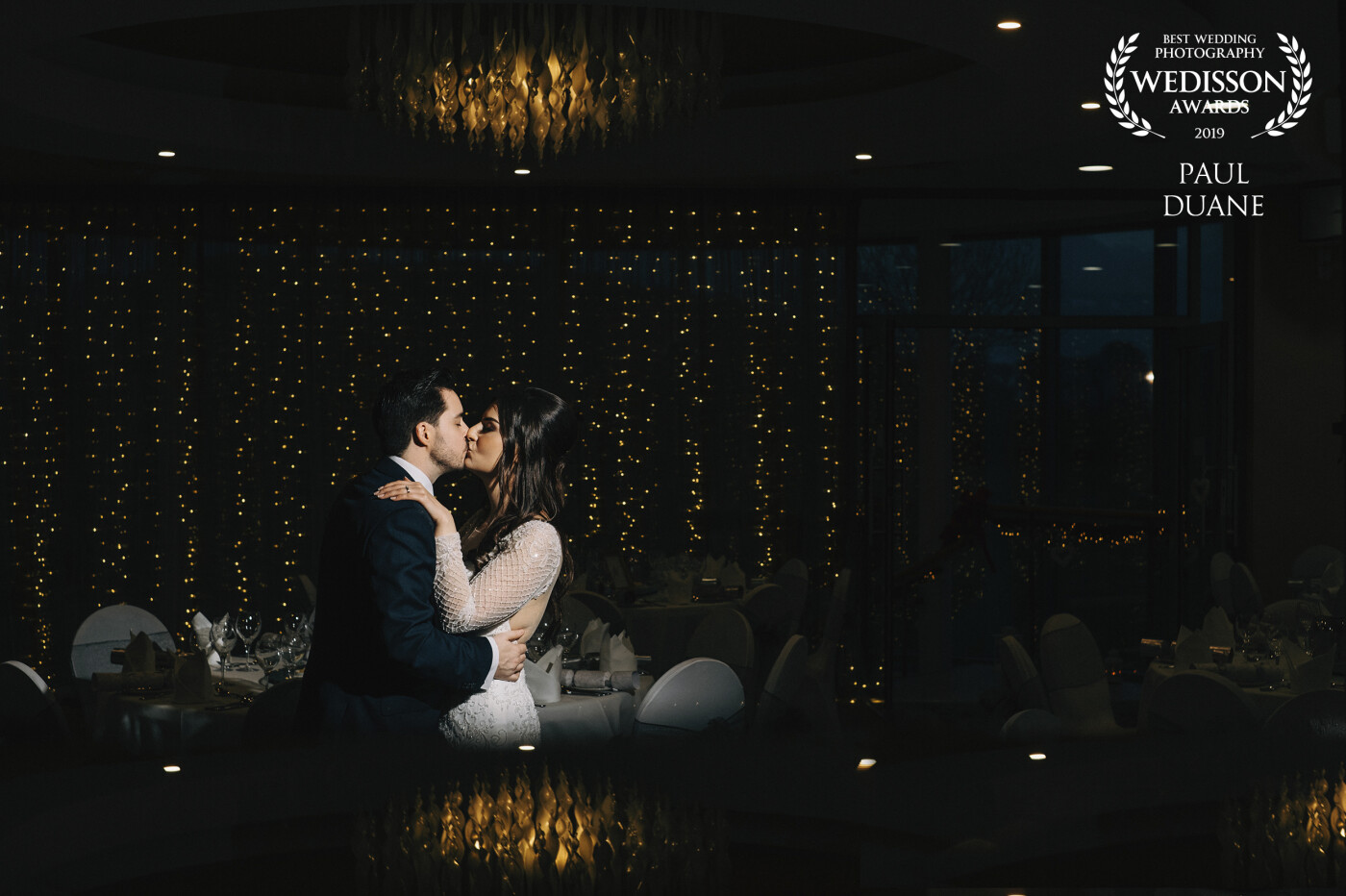 Love, Light, and Reflections: Fernanda & Kevin just married and all loved up under the lights at the stunning Glasson Country House Hotel in Westmeath Ireland.