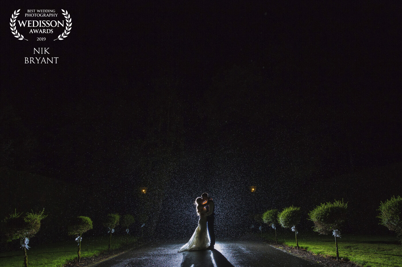 This was the last shot of the night. The bride and groom were insistent we head out in the rain for this shot. I absolutely love it when my couples don't care about the weather and trust me to create something pretty cool!