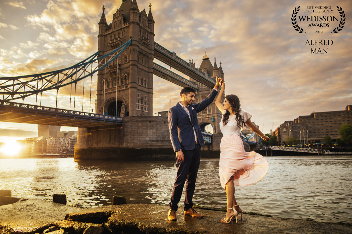 We are thrilled to have this sunset shot with Chandni & Firoz near Tower bridge! It was the moment when the tide reveals the shoreline leaving the ground wet and sparkling. We are so grateful to have our lovely couple taking this adventure with us!