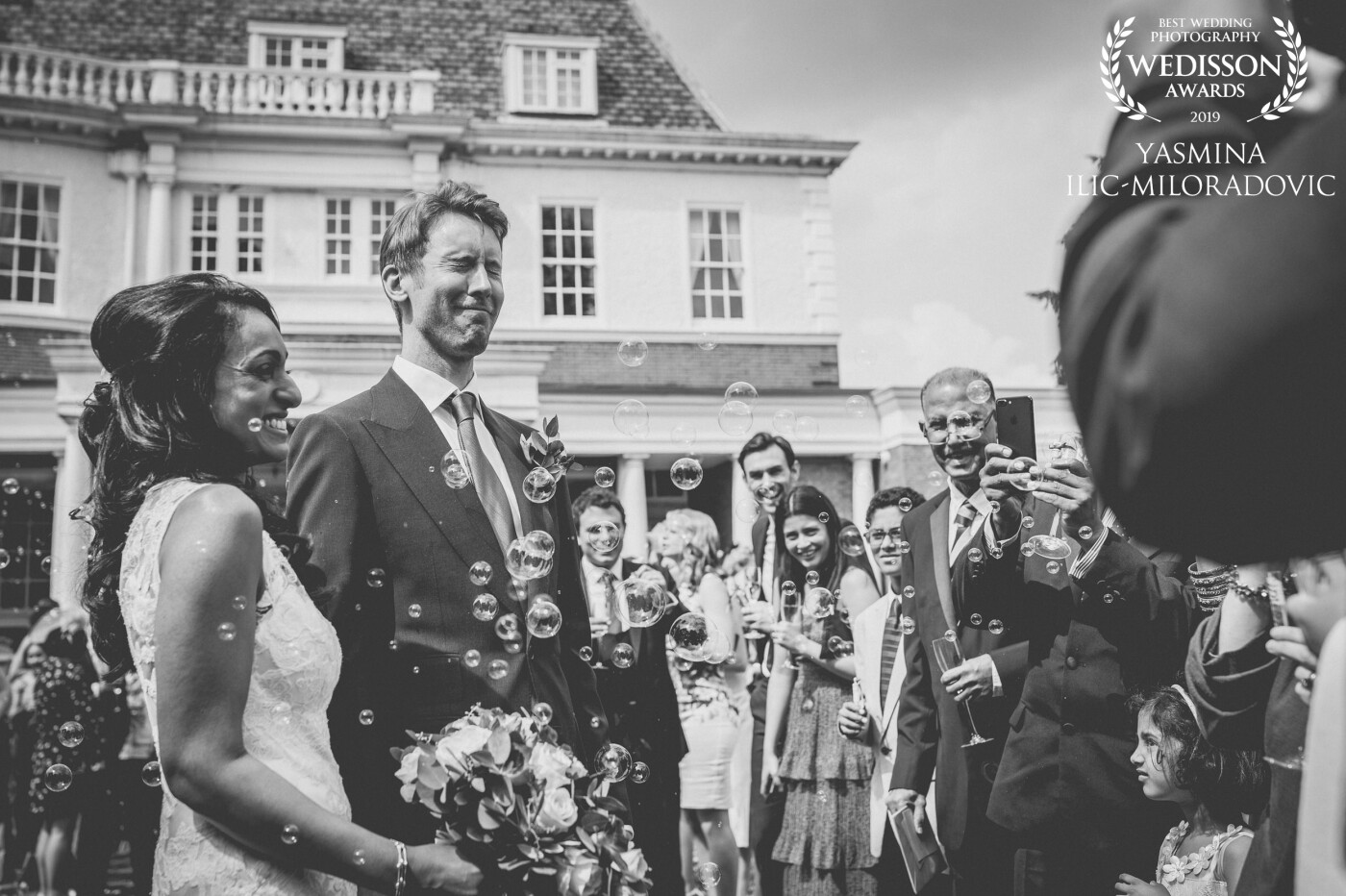 I love this one of Preseetha and Jean-Marc at Cannizaro House (Hotel du Vin, Wimbledon). The faces in the background are so telling of their day - happiness everywhere. Plus, there's nothing quite like bubble confetti!