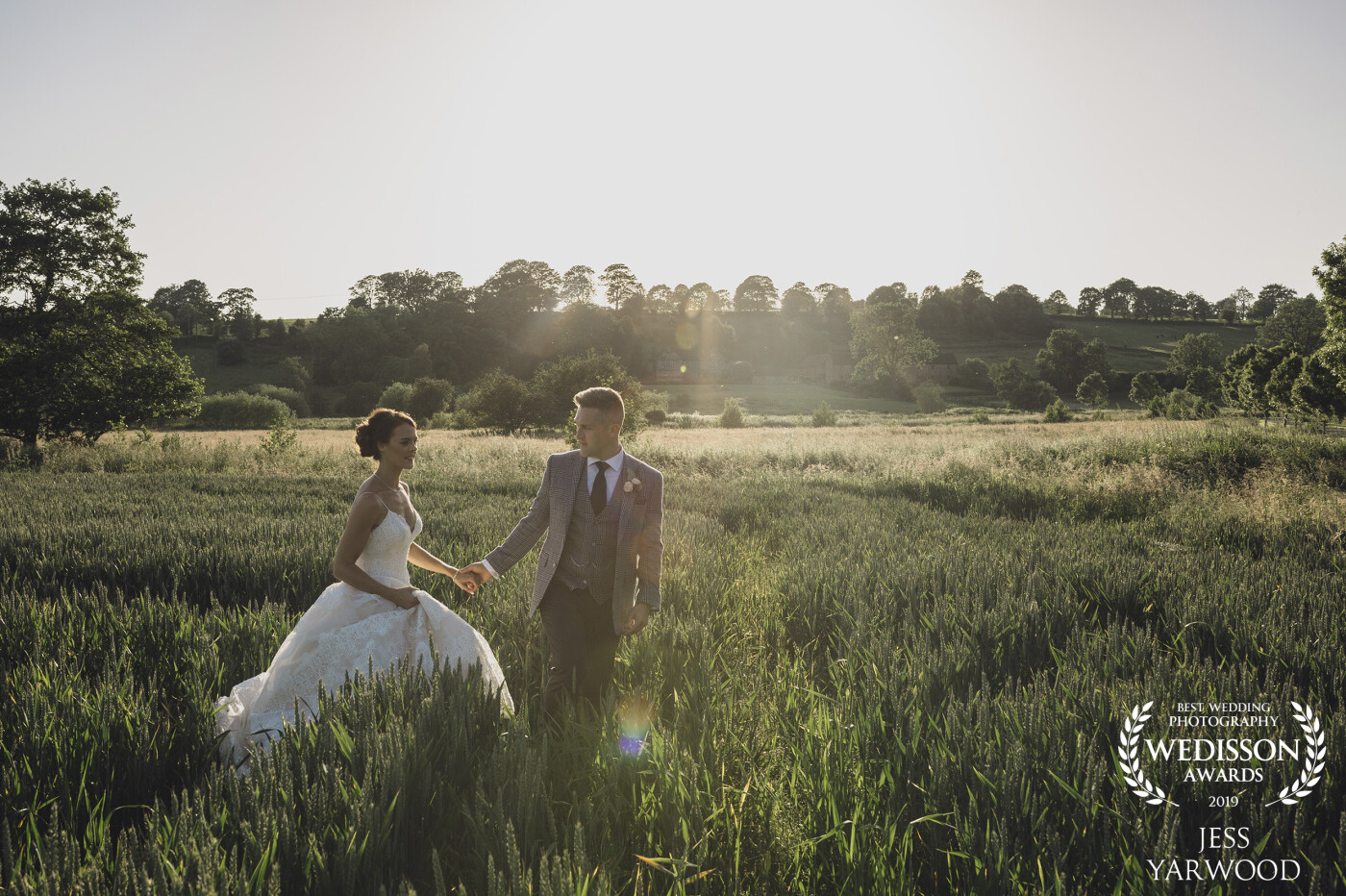 Shooting the wedding of Katie & James at The Ashes Wedding Barn in Staffordshire. We had a small window with golden light just before their first dance. <br />
<br />
Gorgeous golden light in a field of dreams!