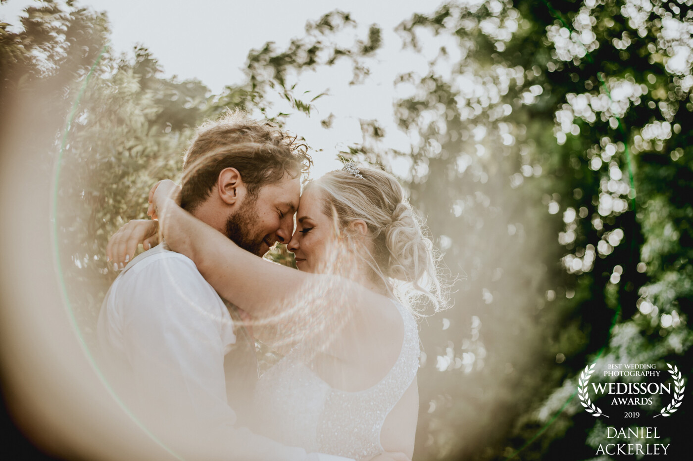 Matt & Kelly had an amazing day over in France, and the sunlight popping through the trees made for a perfect opportunity to catch this beautiful moment, whilst I used a copper pipe to create the 'ring of fire' effect.