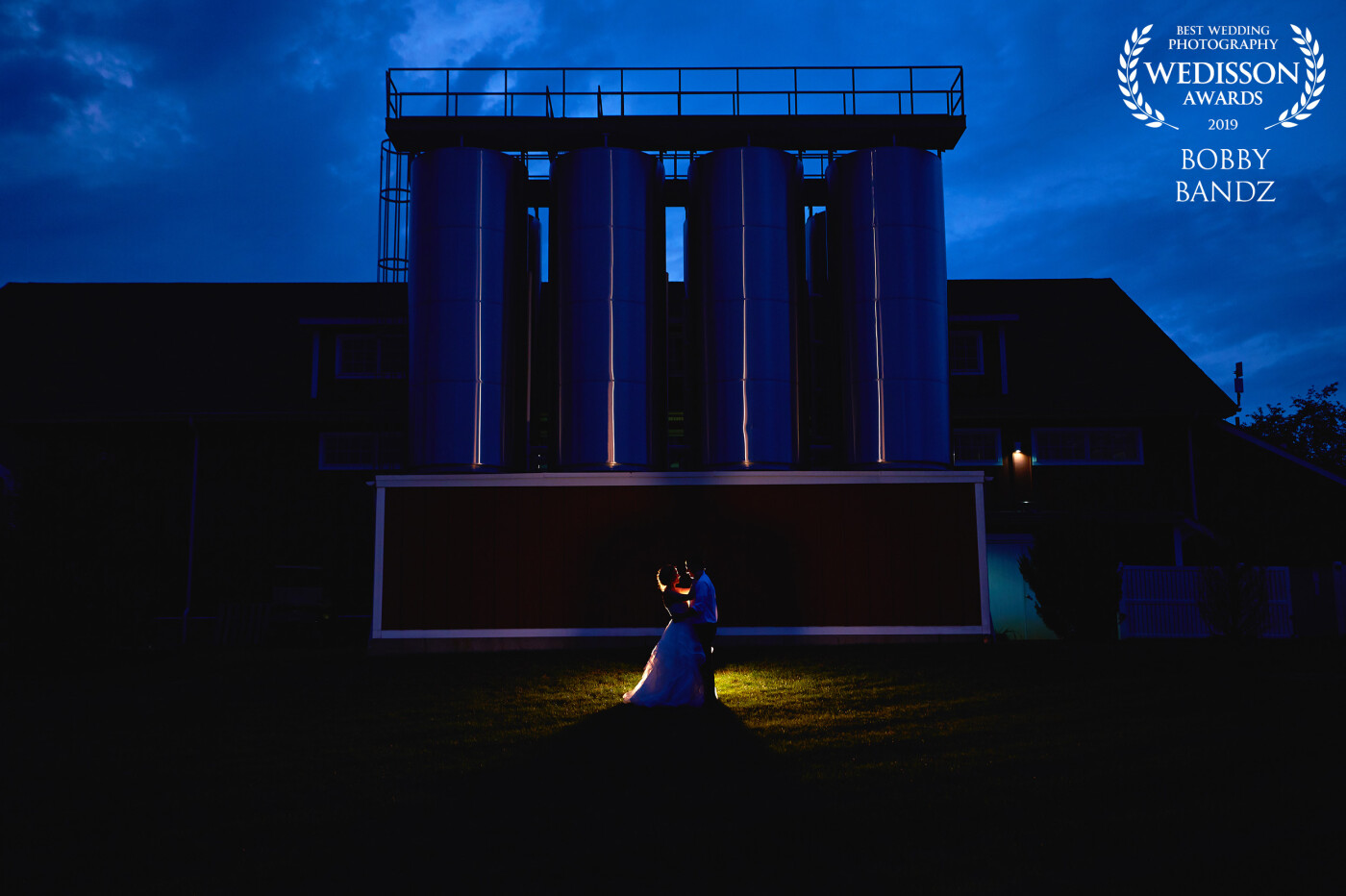 The bride was down to climb up to the top of the silo but couldn’t fit her dress through the opening so we went to the next best thing...a wide shot to show the entire landscape! Boom! Crushed it!