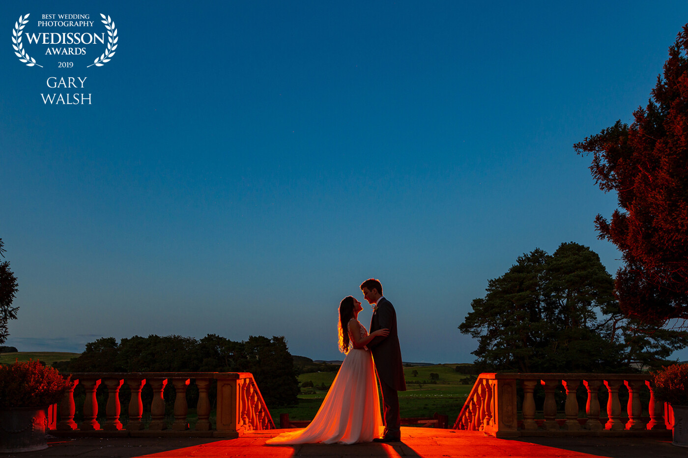 I love working with a Bride & Groom who are happy and willing to leave their party for 10 minutes and hold each other for one final shot. The last of the daylight with the help of a flash and gel. Taken In Northumberland at Woodhill Hall. 