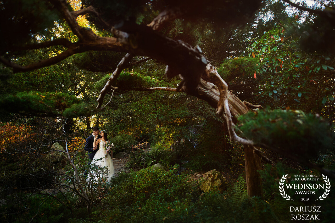 The photo was taken in a beautiful Japanese garden in Wroclaw (in Poland). An amazing place where a photographer has unlimited possibilities. The young couple was very willing to cooperate and the effects can be seen in the picture.