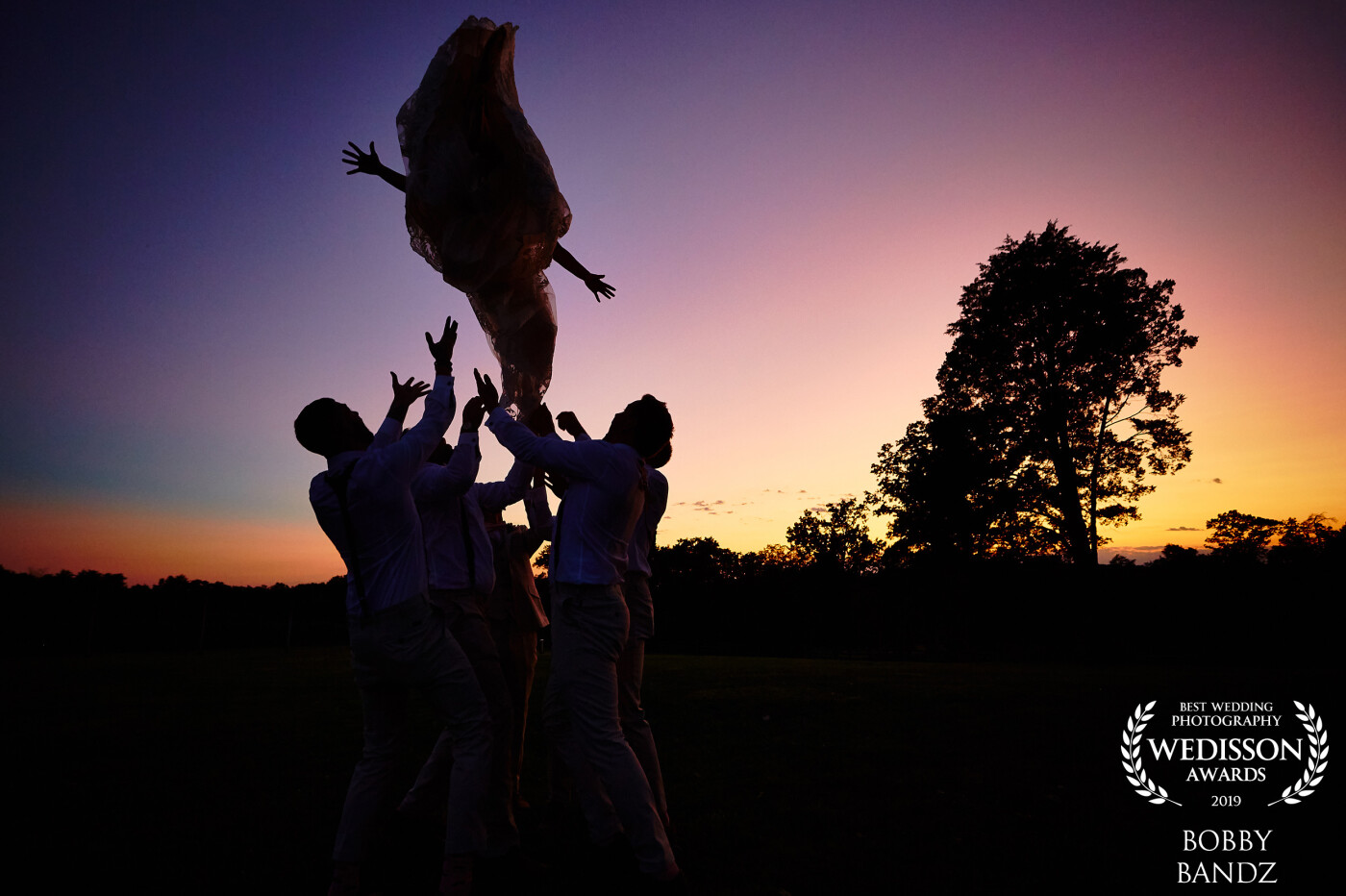 The groom wanted an epic toss in the air from his groomsmen to celebrate his marriage so what did we do....we threw him in the air! To my astonishment the bride felt left out and wanted to do the same so what did we do...well we threw her in the air at sunset and wow what a shot! I don't think she was ready for it by her arms flailing in the air but she sure had a blast and loved the final photo! What a priceless memory she will never forget!