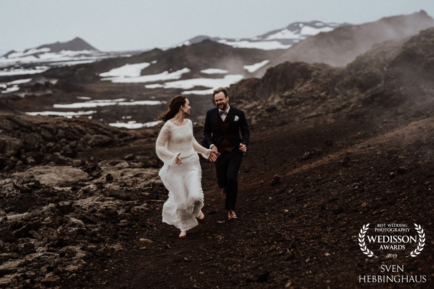 Running up that hill. That was our slogan while climbing the Iceland mountains with a wedding couple. These two lovers had so much fun. Thanks to the judge for choosing this pic.
