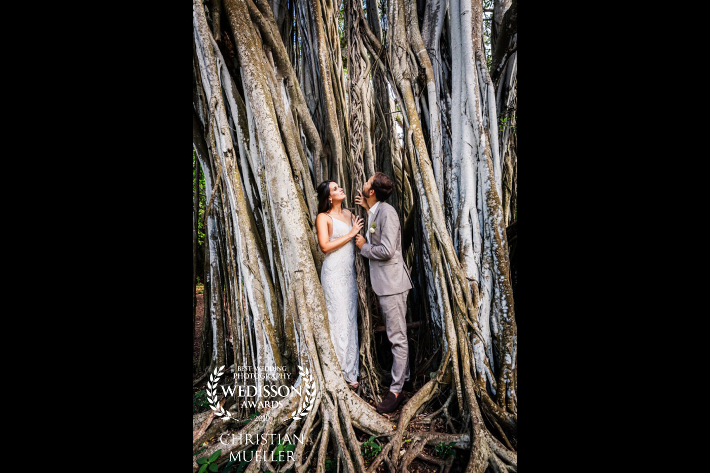 It was a great experience to photograph my first destination wedding on Oahu, Hawaii, with this lovely couple. Ahead of the wedding I searched in the web for good locations and found this awesome, huge banyan tree in a regional park, 20 minutes far away from their venue. The aspiring roots give perfect imagery for their marital happiness.