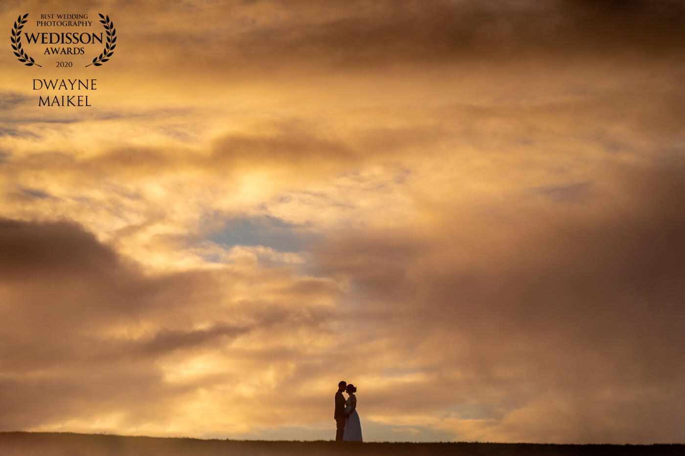 A lovely cold, winter wedding. Beautiful sunset sky. Thanks, Wedisson for picking this one out.   